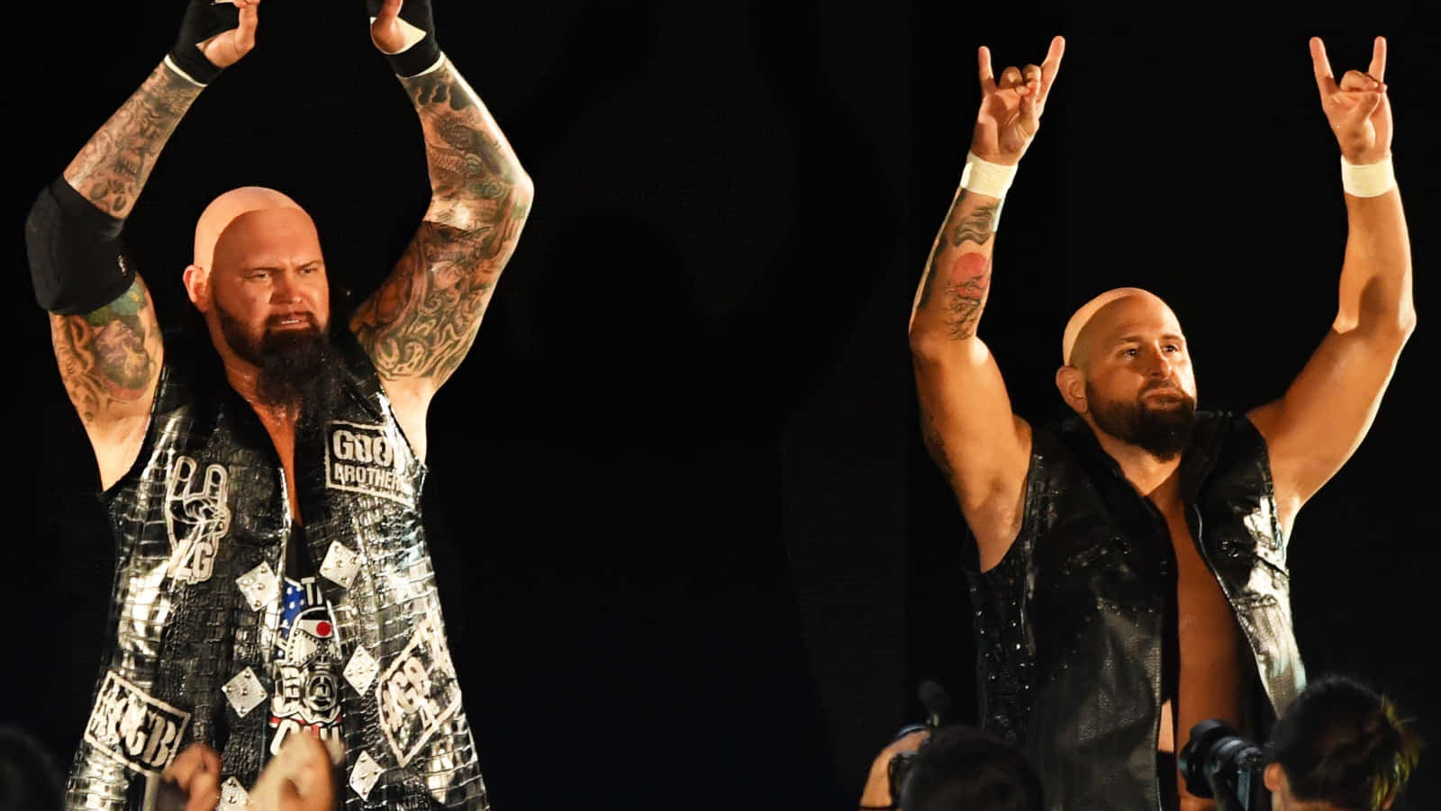 Rock And Roll Sign Of Karl Anderson & Doc Gallows Background