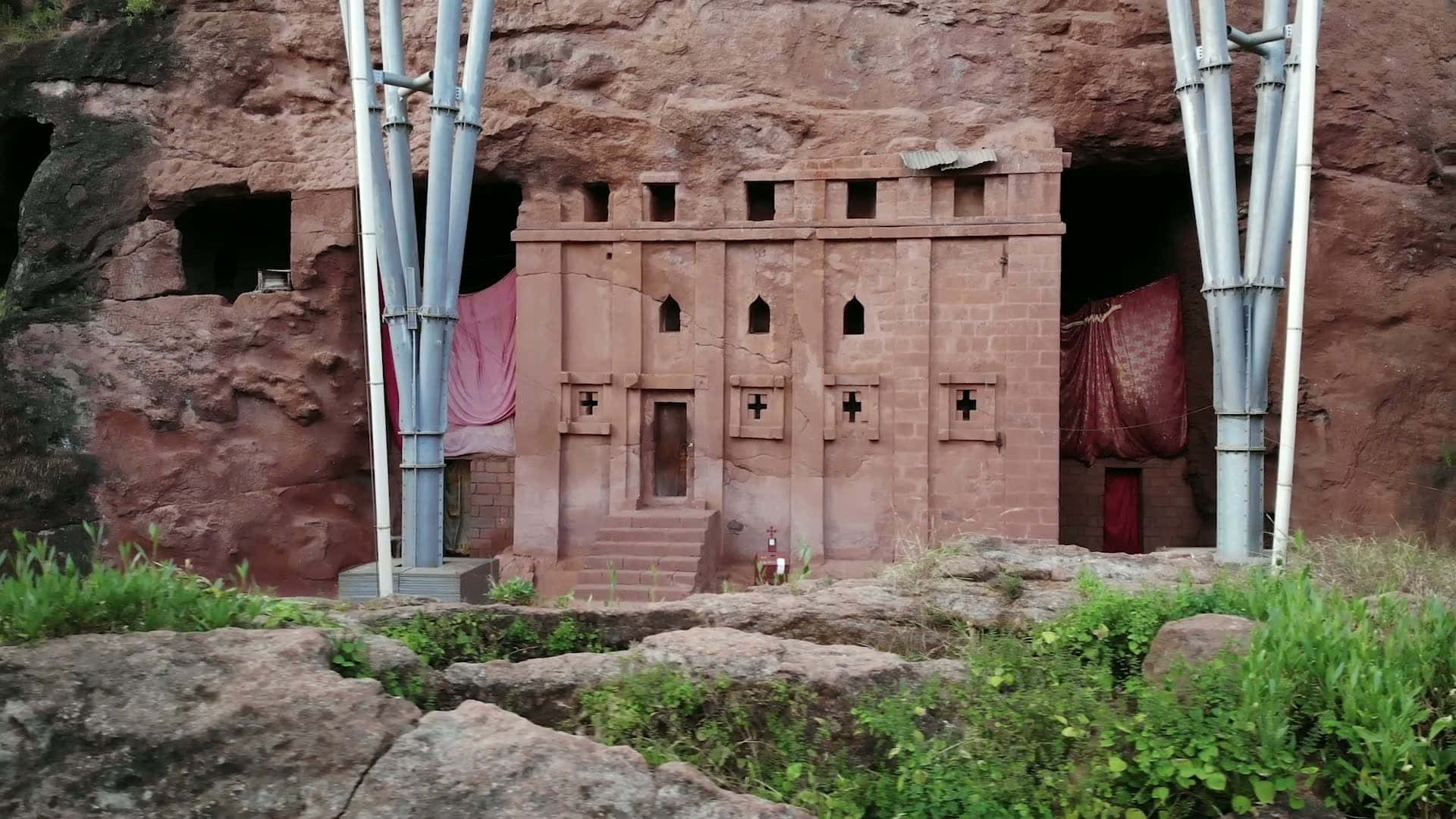 Rock-cut Structure Of Biete Abba Libanos In Lalibela Background