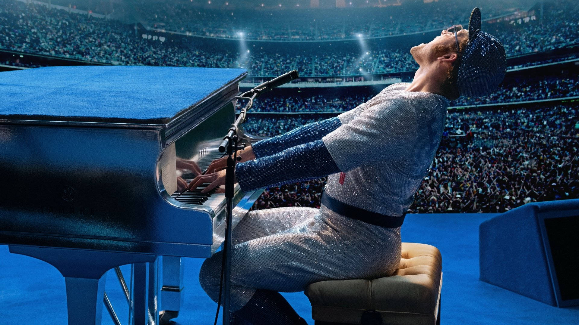 Rocketman Lively Performance Playing Piano Background