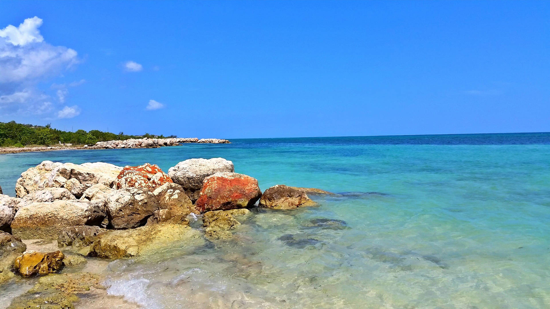 Rocks On Montego Bay Beach Background