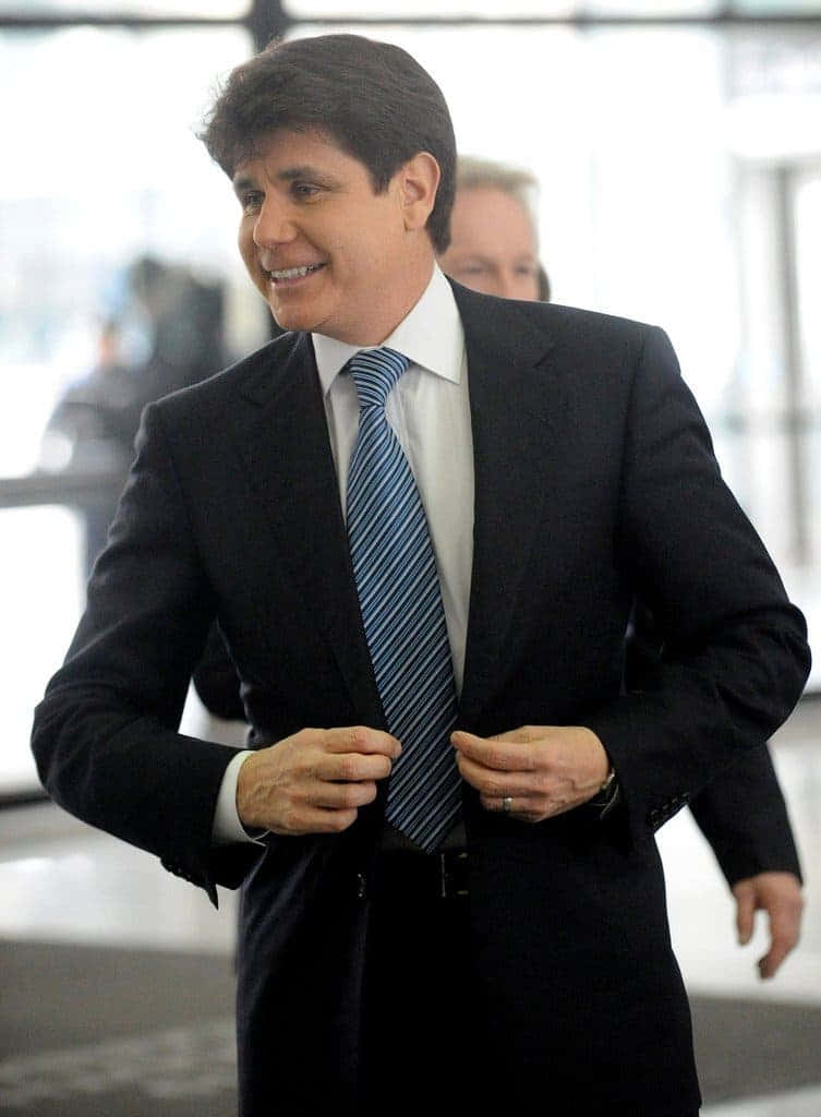 Rod Blagojevich Fixing Coat Button Background
