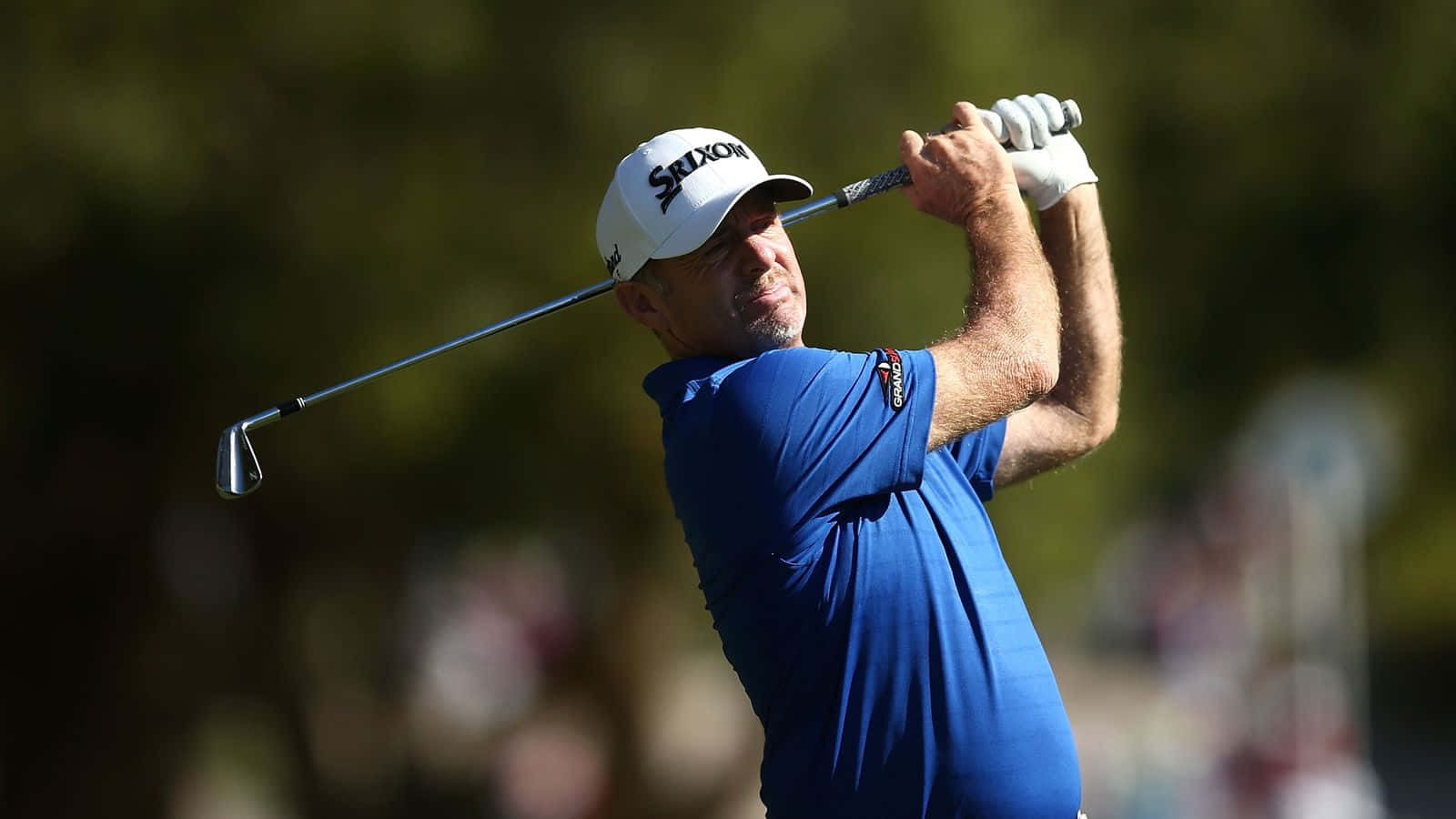 Rod Pampling In Blue Golf Shirt Background