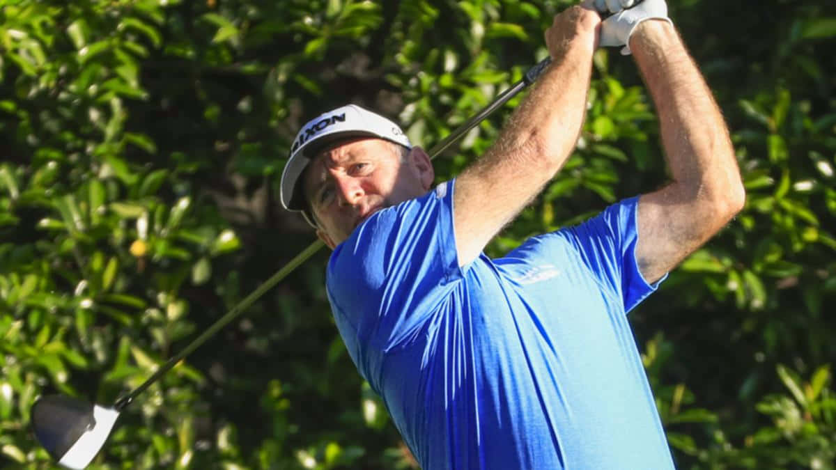 Rod Pampling In Blue Shirt Background