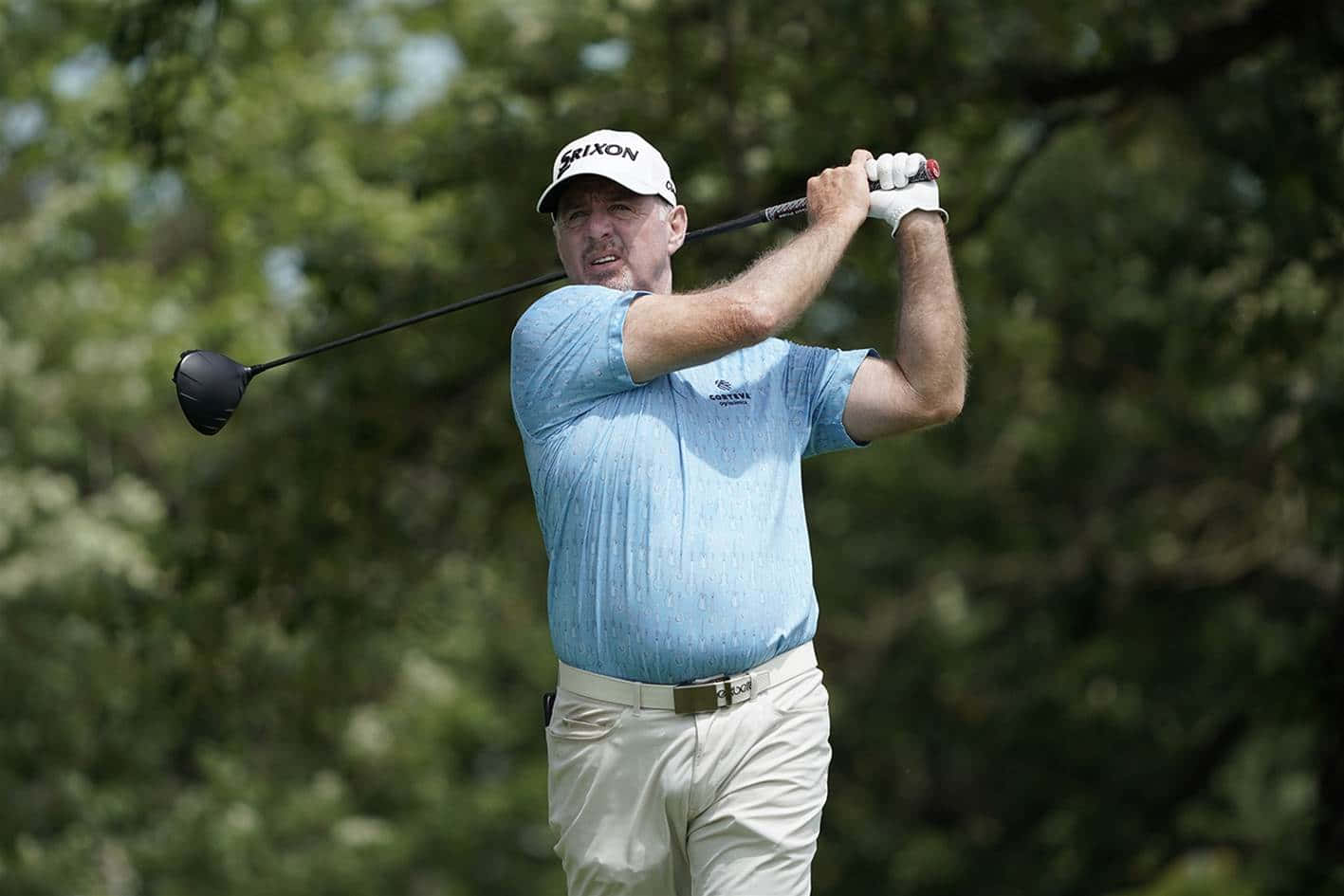 Rod Pampling In Light Blue Shirt Background