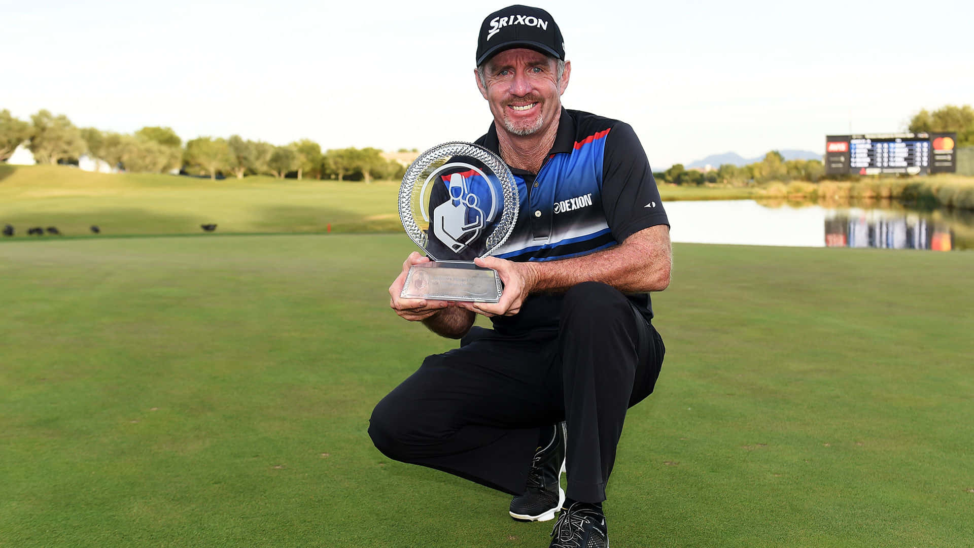 Rod Pampling Posing With Trophy Background