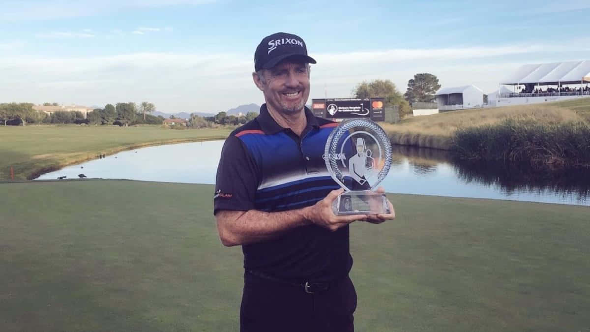 Rod Pampling Smiling With Trophy Background