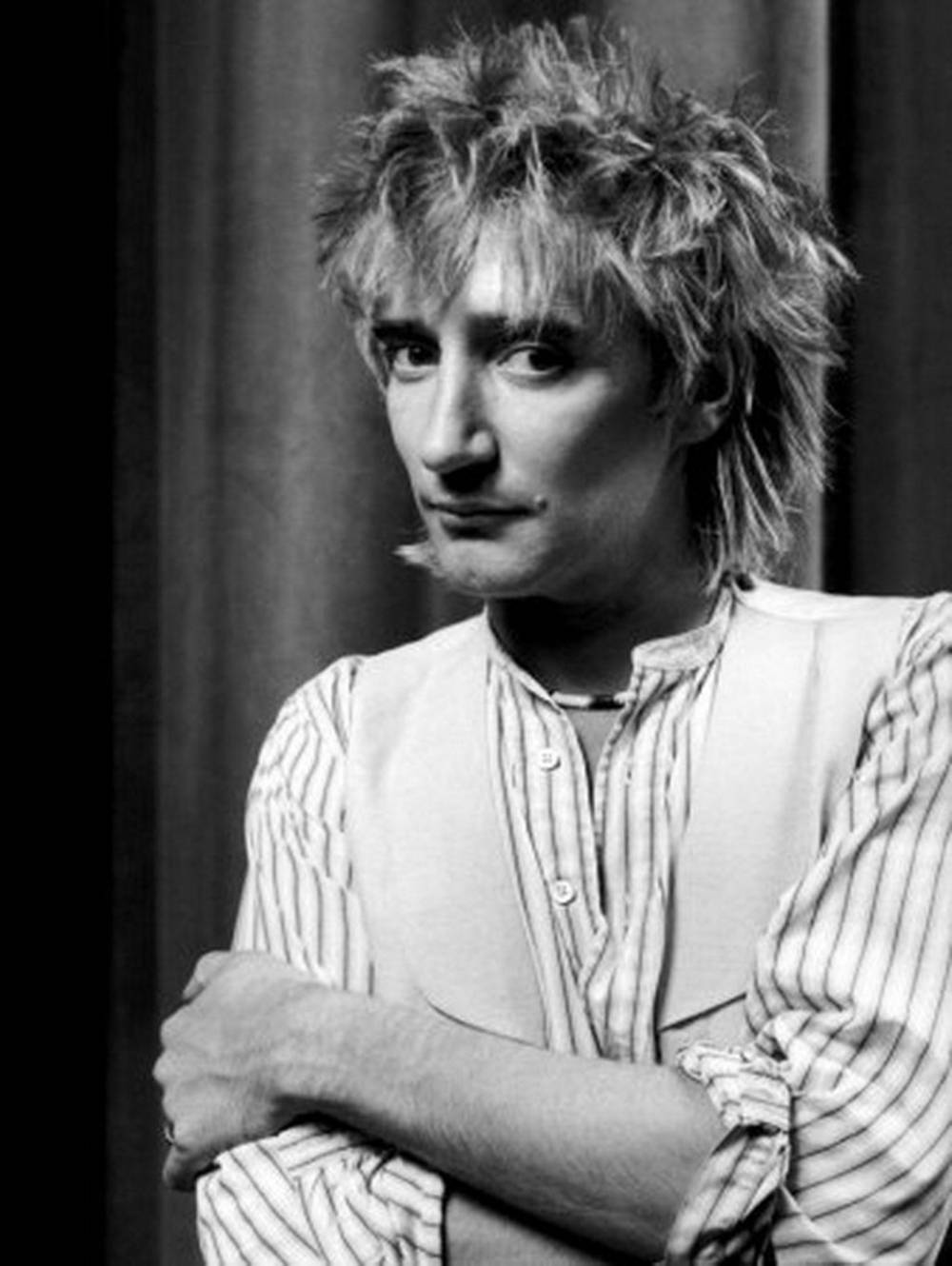 Rod Stewart Iconic Singer And Songwriter Background