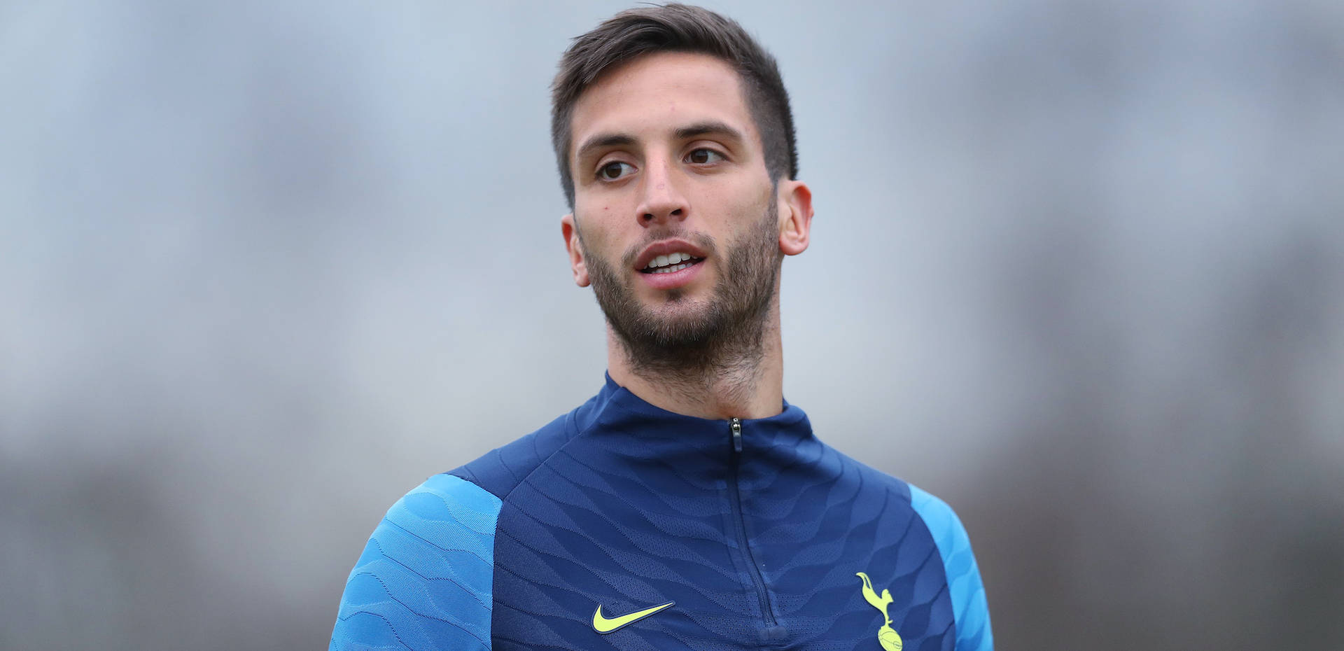 Rodrigo Bentancur Wearing Blue Jacket Background