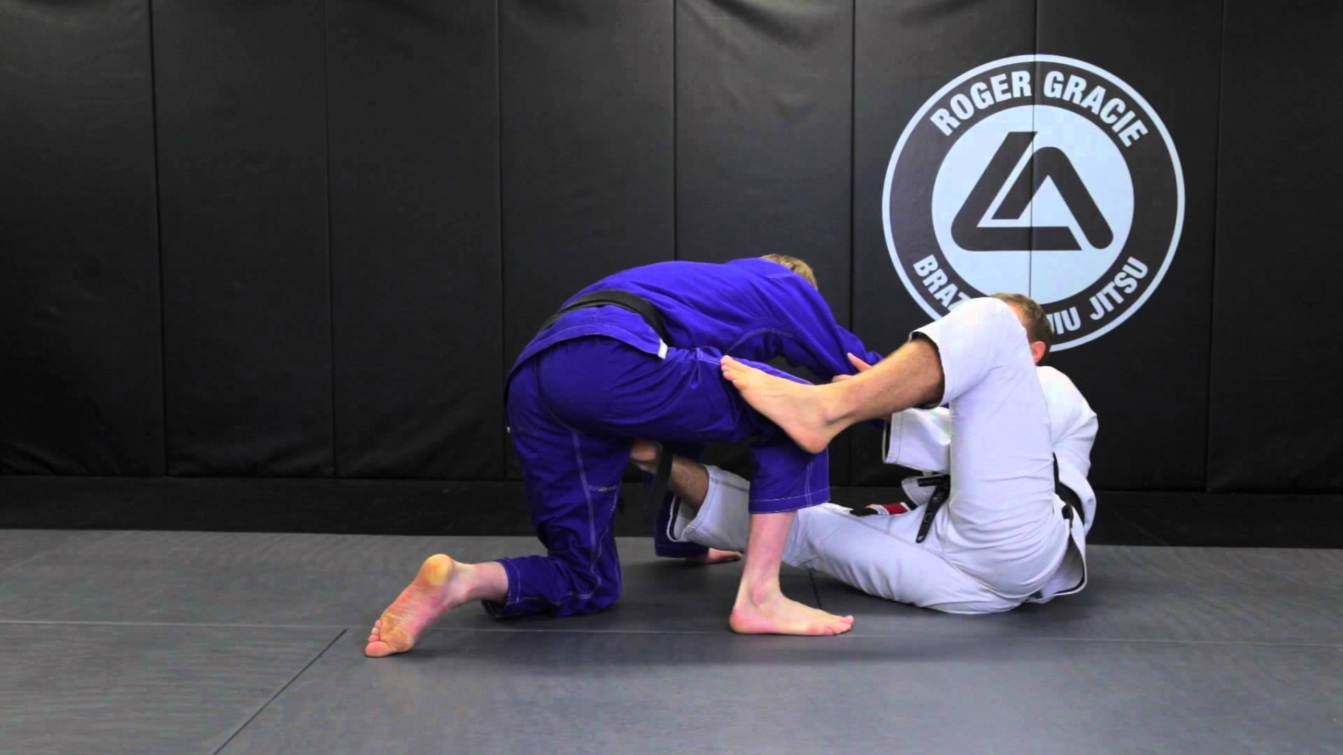 Roger Gracie Practicing Brazilian Jiu-jitsu In Studio Background