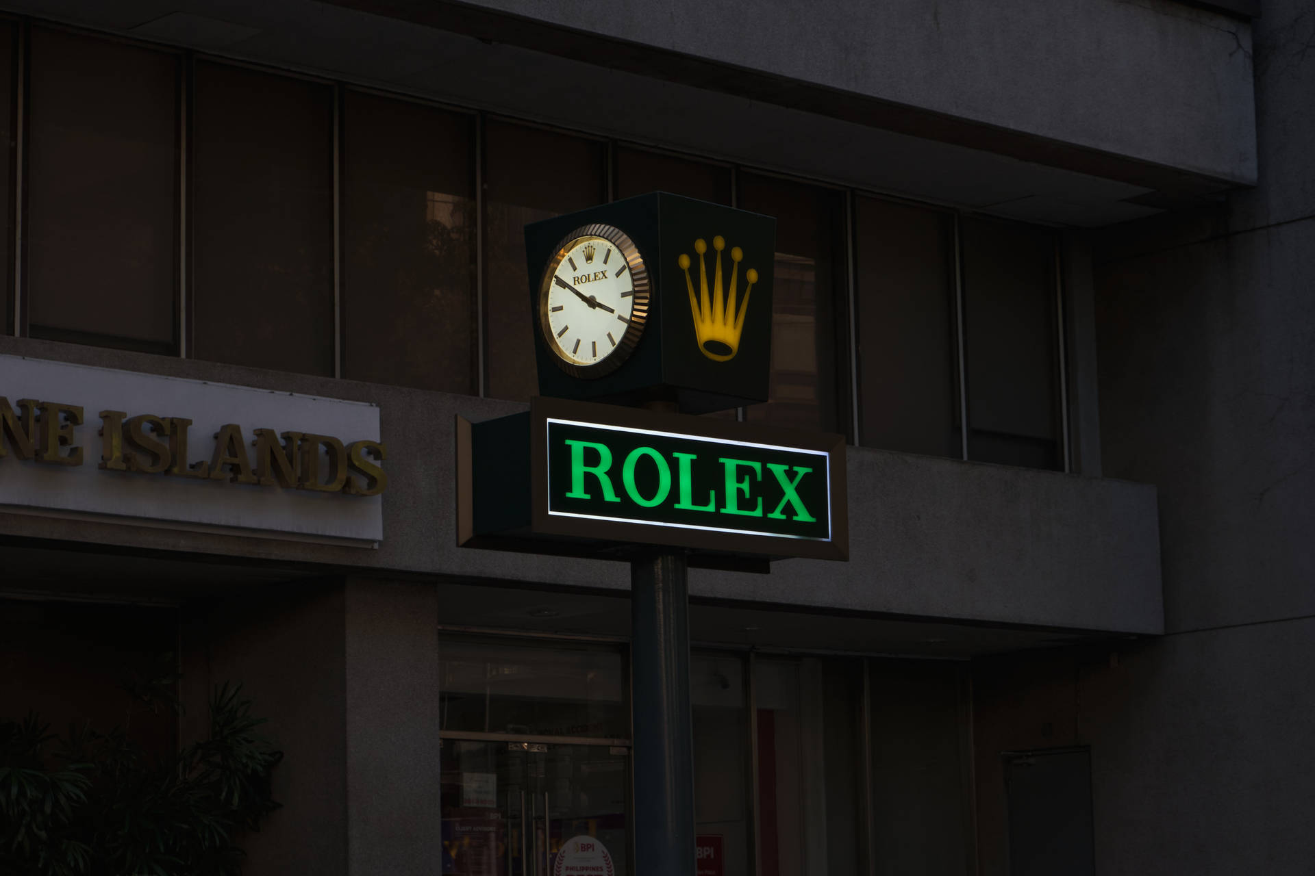 Rolex Logo Clock Signage Background