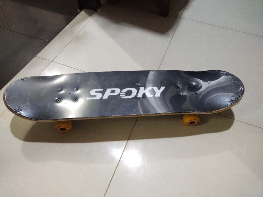 Roll With Us On Our Premium Skateboard Brand Background