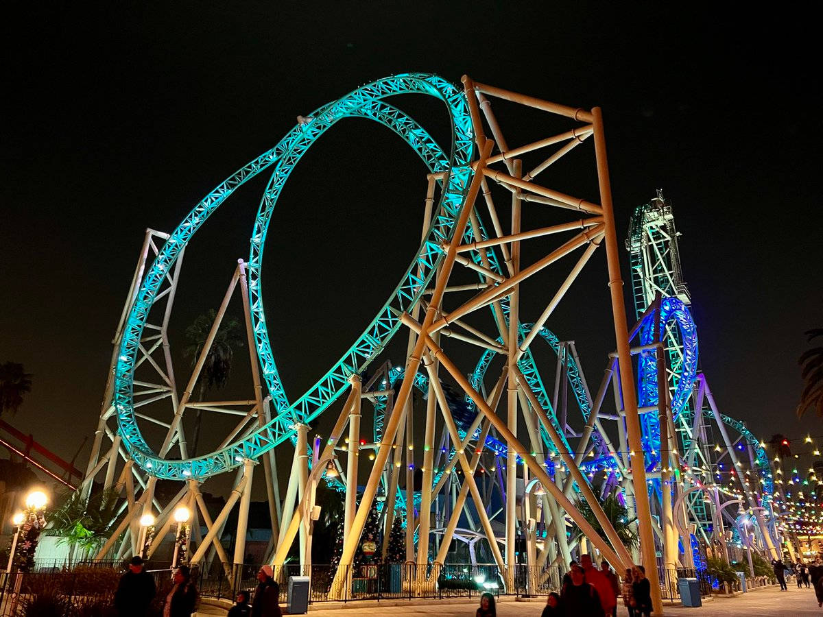 Roller Coaster With Teal Light Background