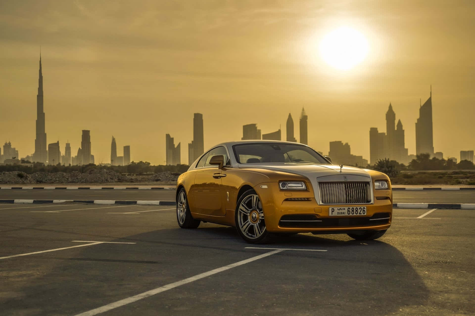 Rolls Royce Gold Cars In Dubai Background