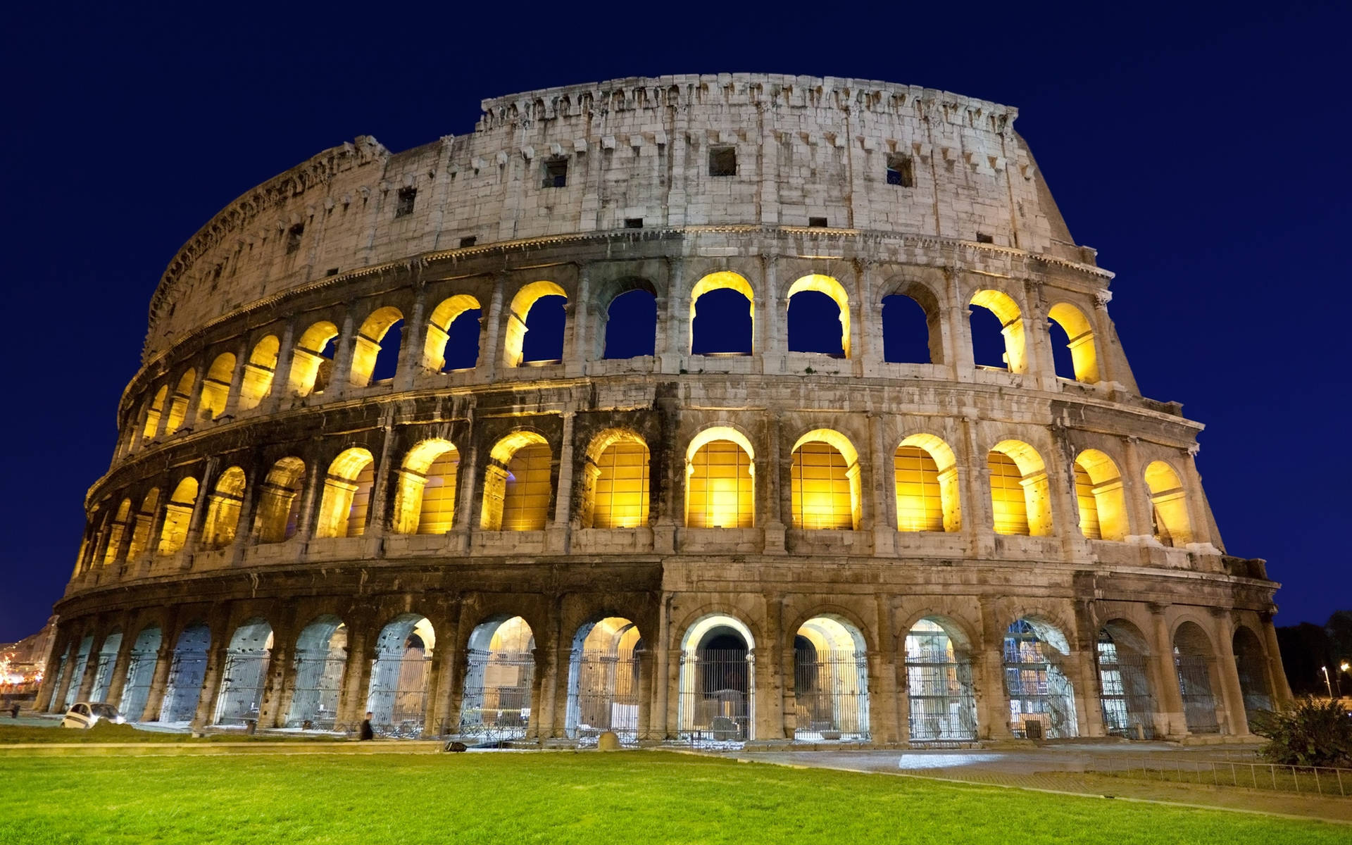 Roman Colosseum Beneath The Clear Night Sky Background