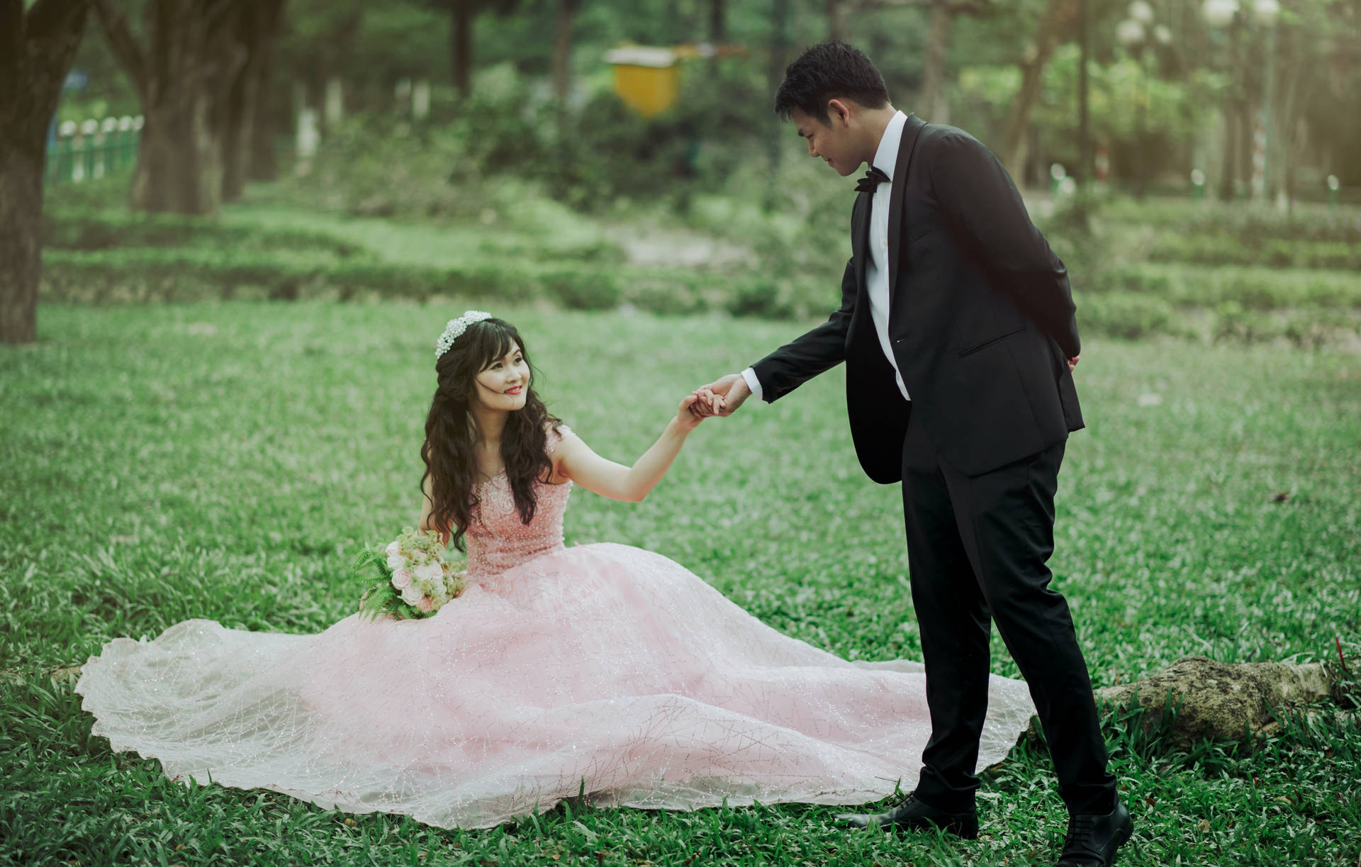 Romantic Asian Couple Prenup On Grass
