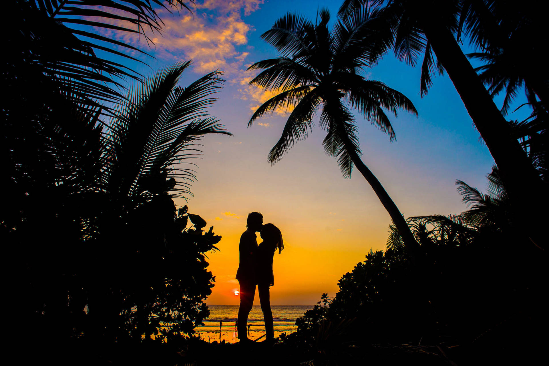 Romantic Couple Beach Kiss Silhouette Background