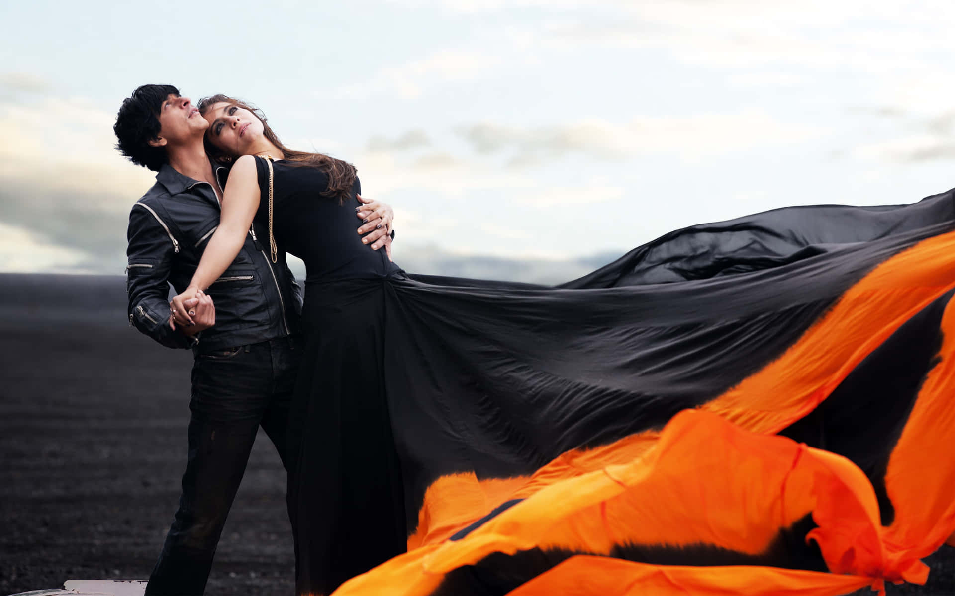 Romantic Couple Black Orange Dress Background