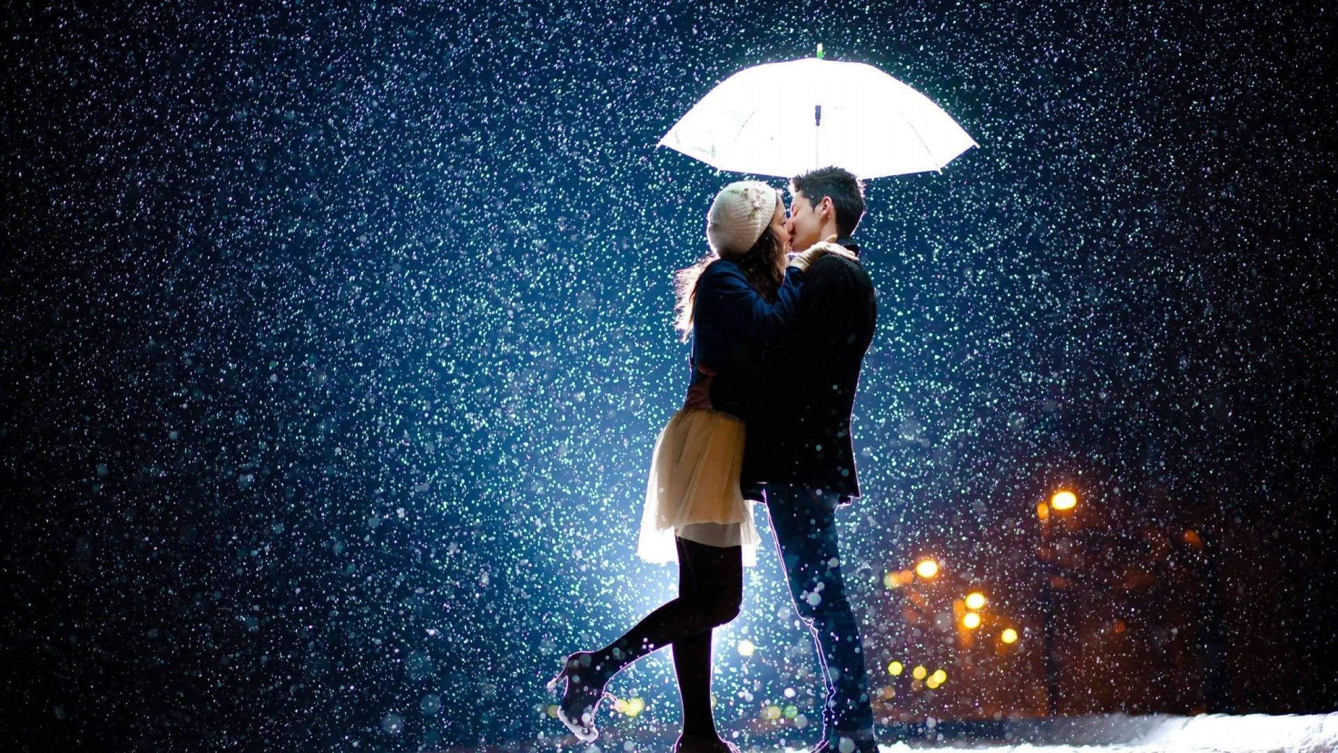 Romantic Couple Kissing In The Rain Background