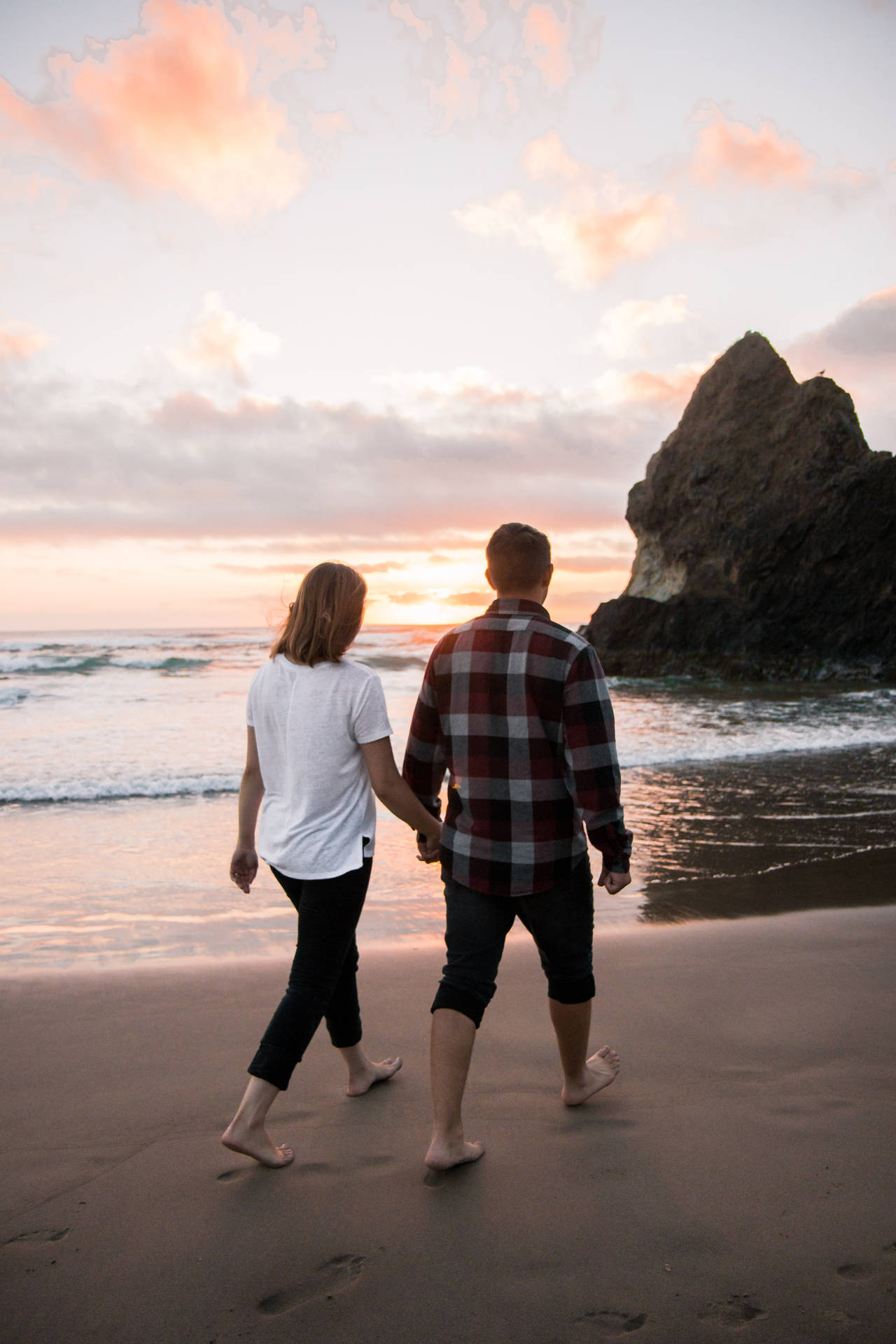 Romantic Couple Walking On The Shore Background