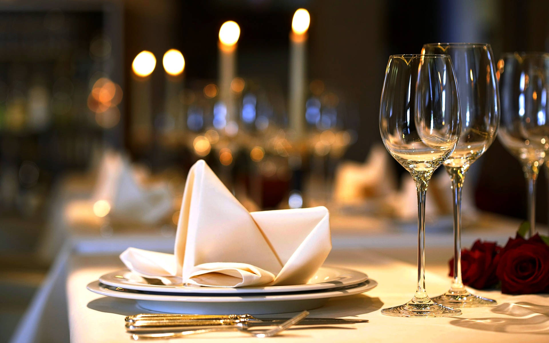 Romantic Dinner Setup With Fine Wine Background