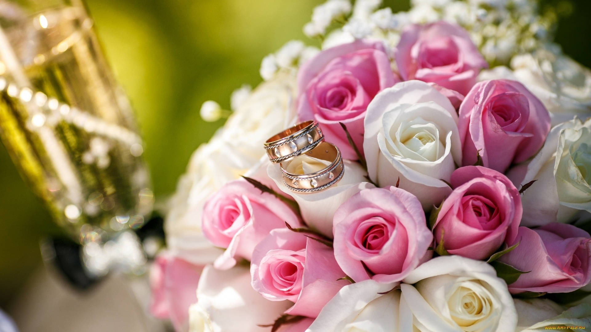 Romantic Wedding Rings On A Beautiful Bouquet Background