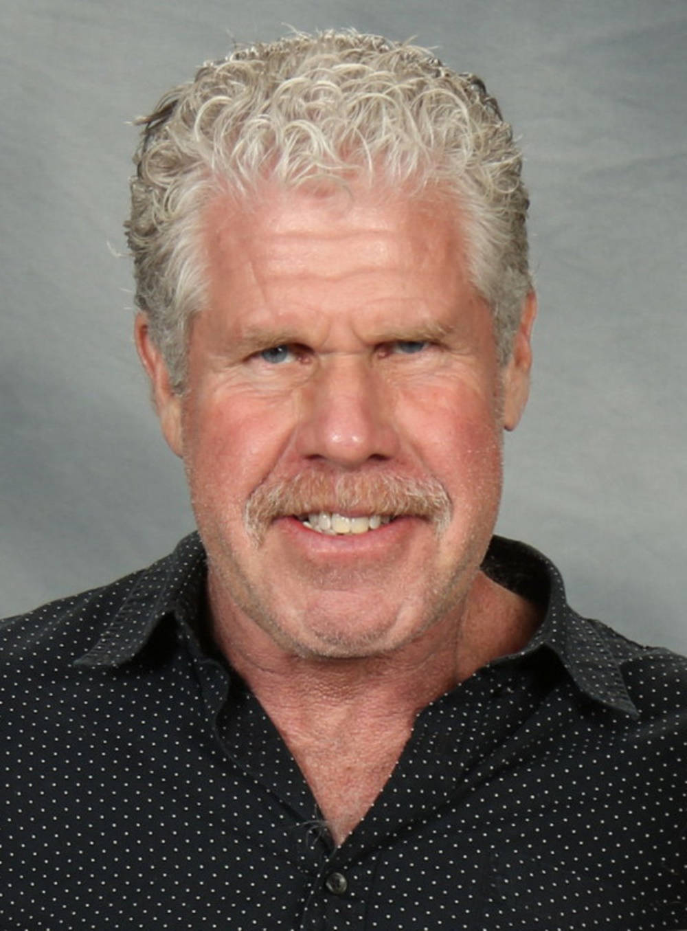 Ron Perlman Grinning Smile Background