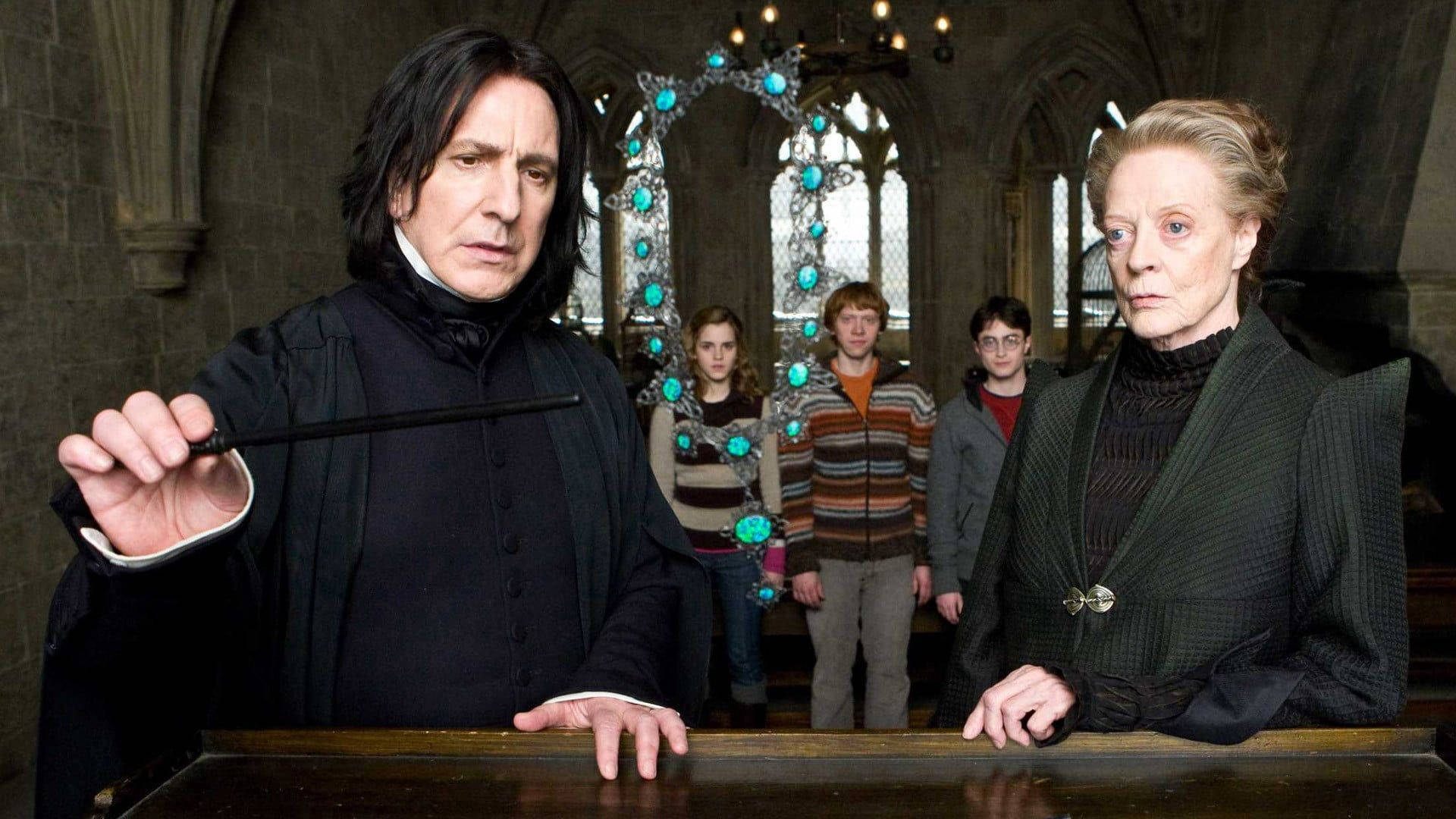 Ron Weasley, Professor Mcgonagall And Professor Snape Stand Together At Hogwarts. Background