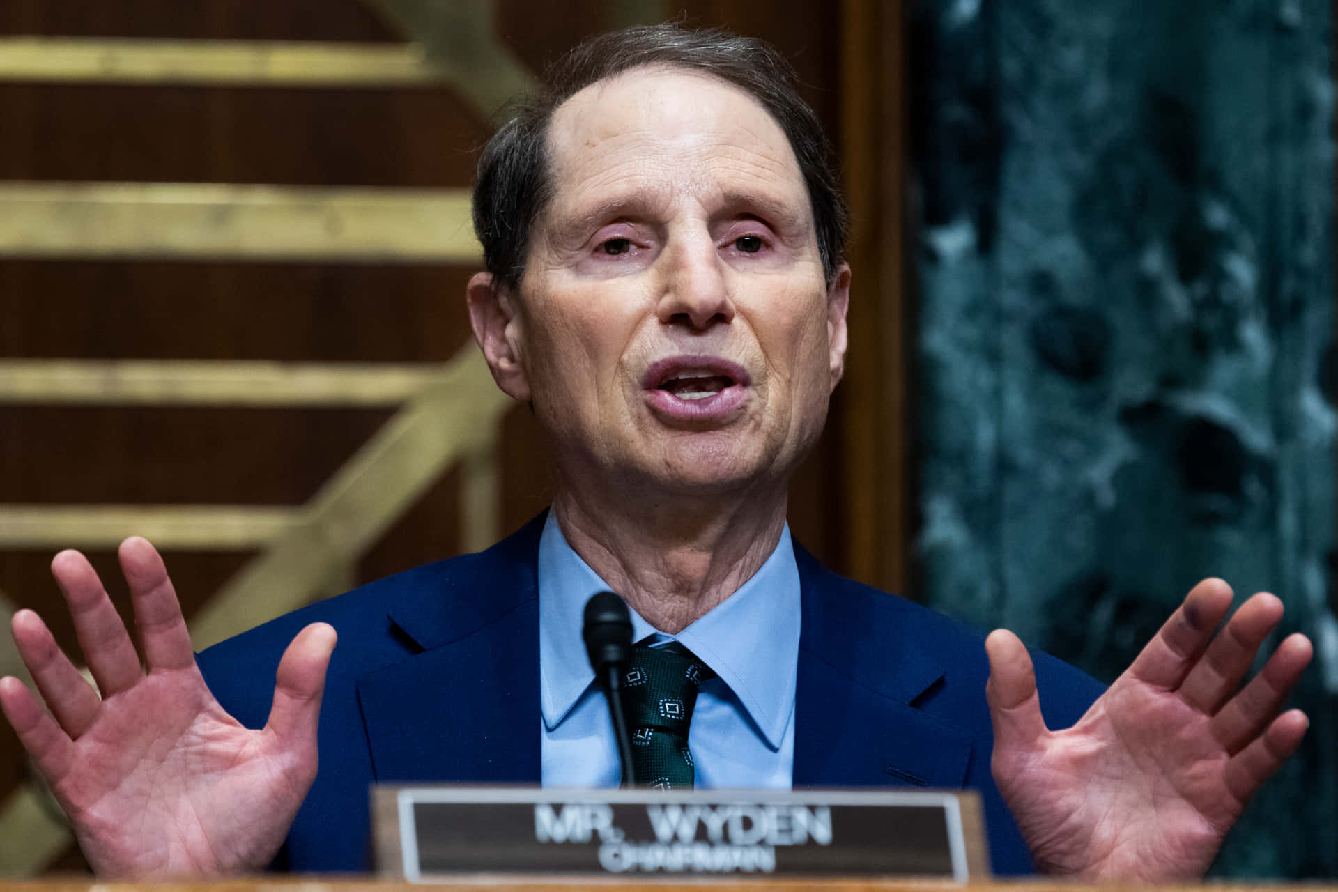 Ron Wyden With Open Hands Background