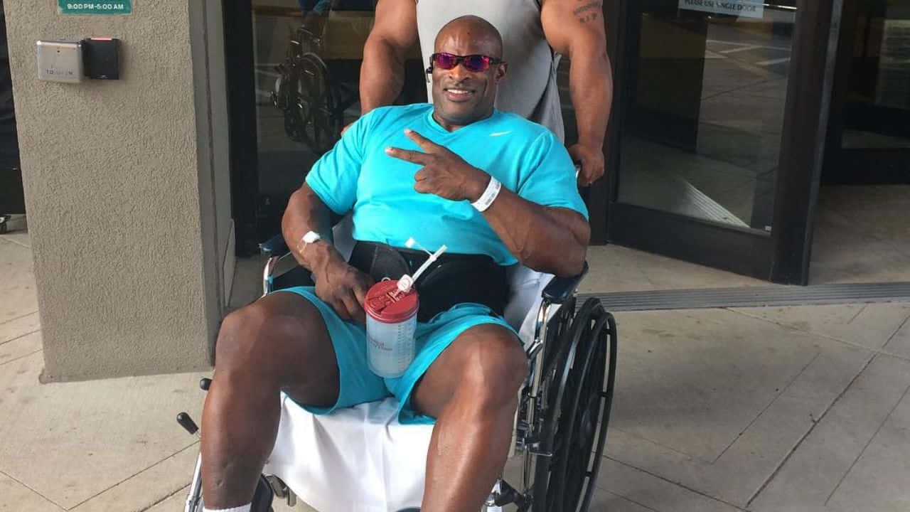 Ronnie Coleman In Wheelchair Background