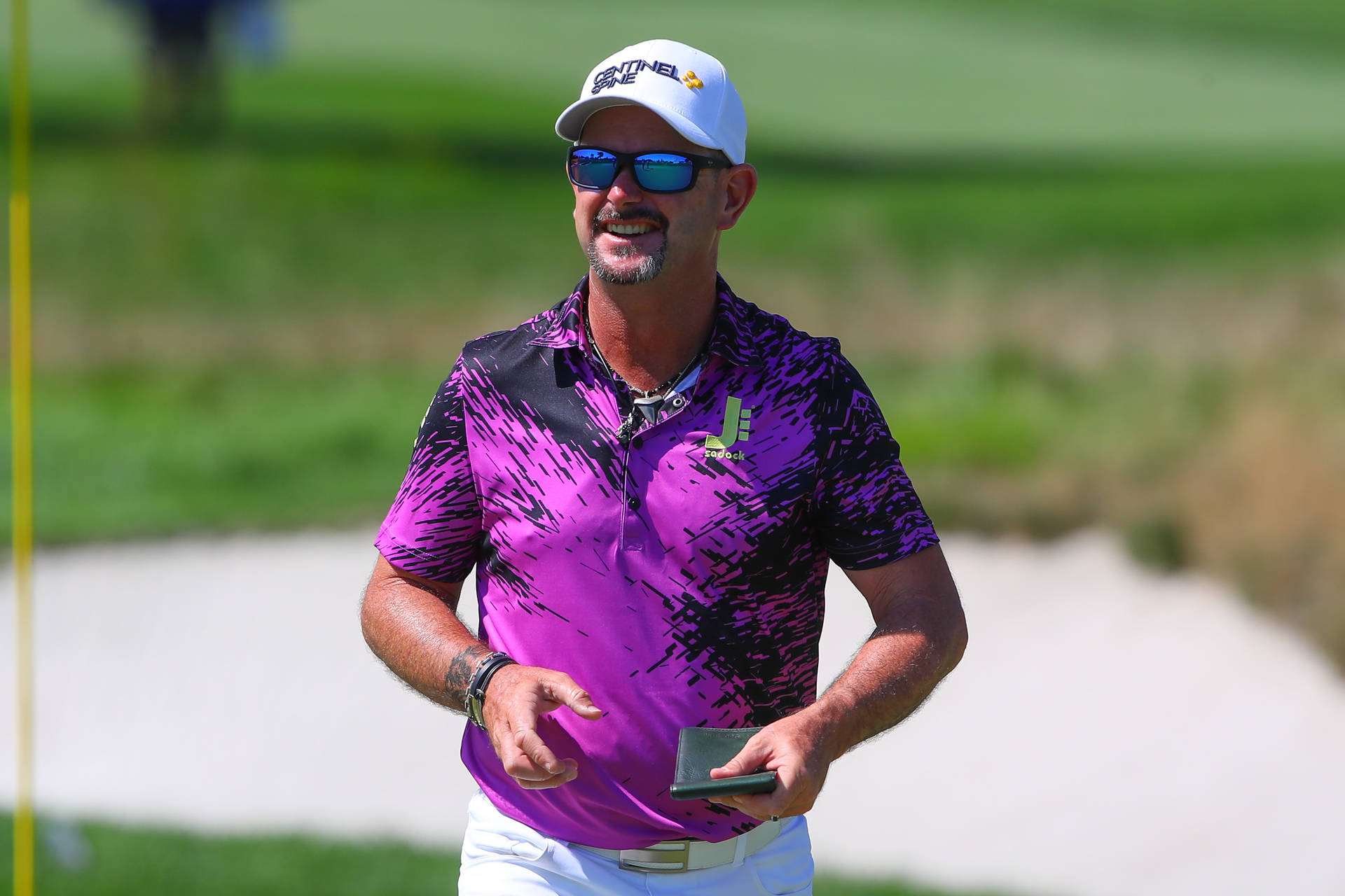 Rory Sabbatini In Bright Violet Shirt Background