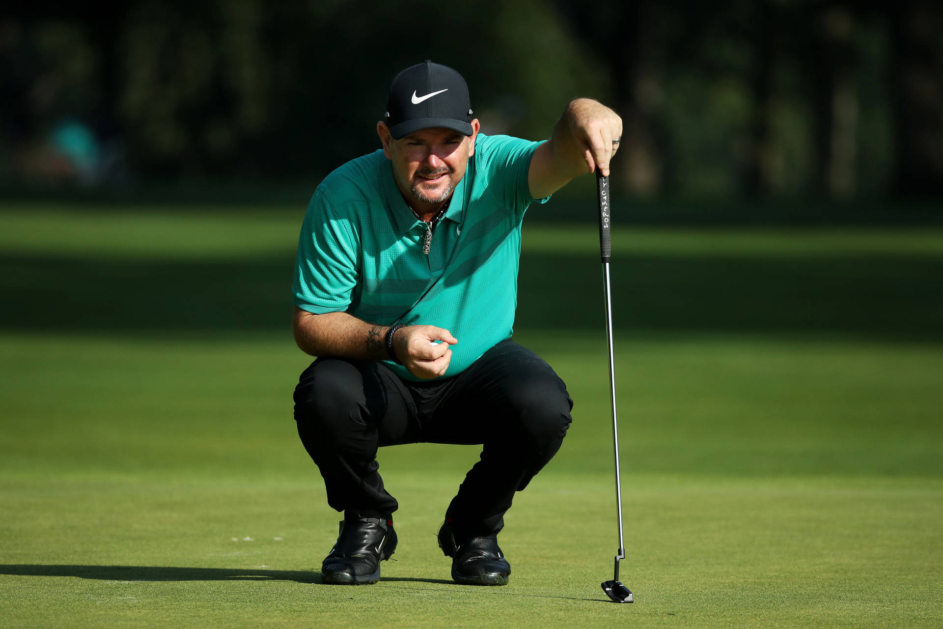 Rory Sabbatini Sitting Position Background