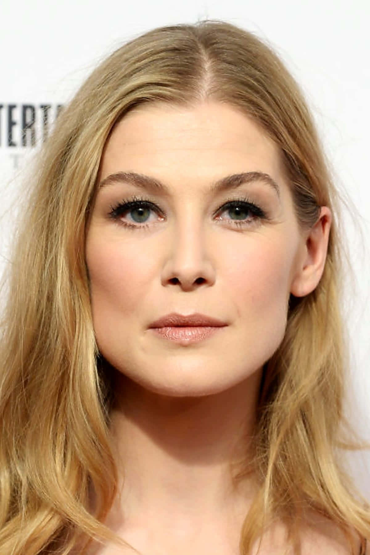 Rosamund Pike At A Red Carpet Event Background