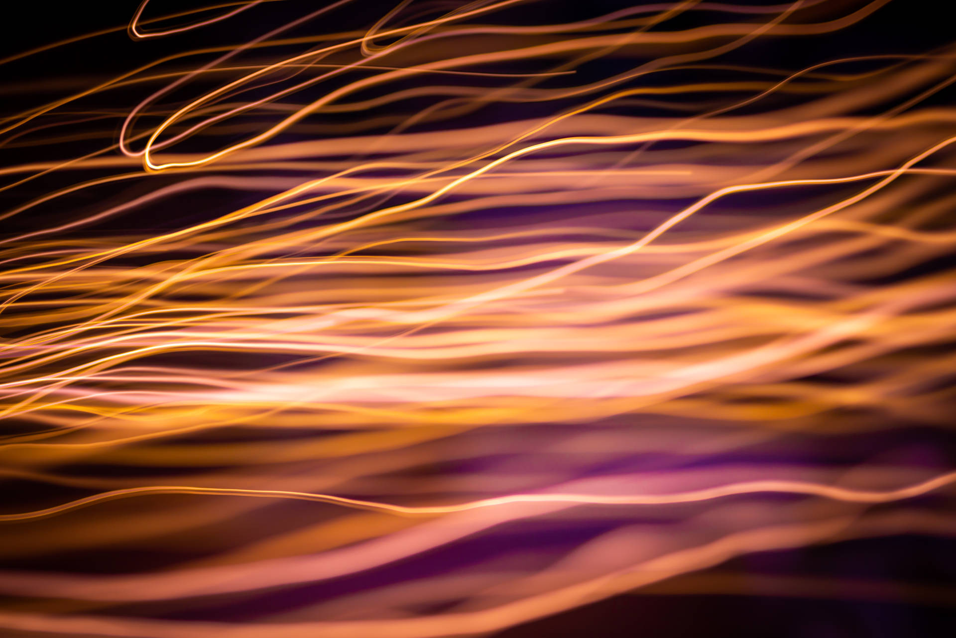 Rose Gold Fire In The Dark Background