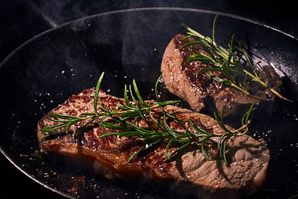 Rosemary Cooking Meat On Pan Background