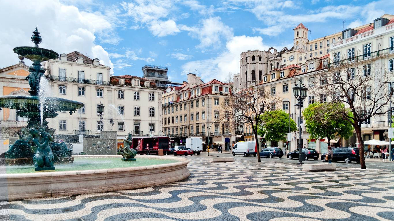 Rossio Square Daytime In Lisbon Background