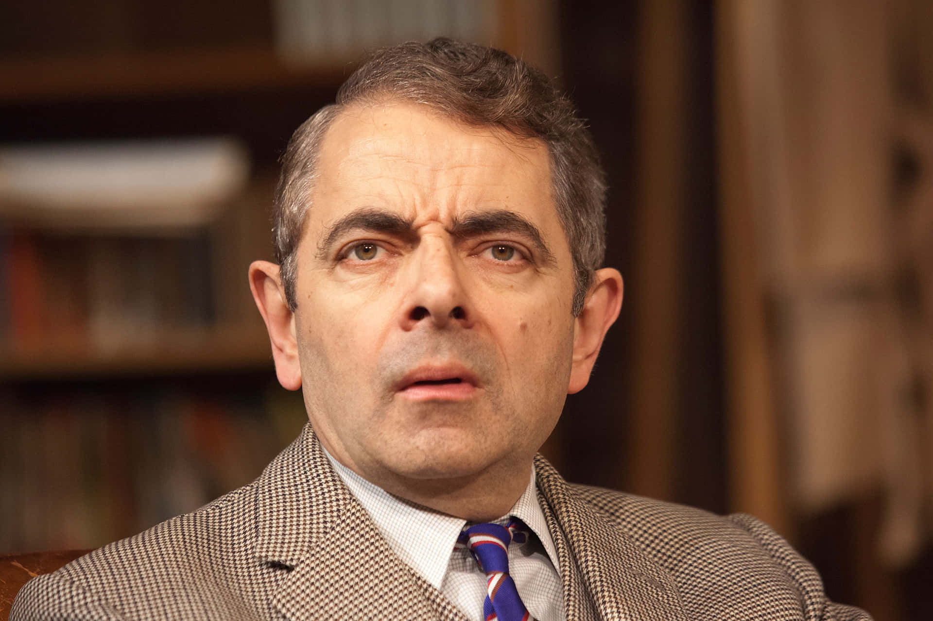 Rowan Atkinson In Confusion Background