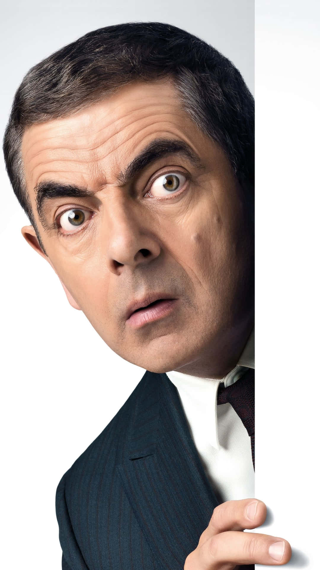 Rowan Atkinson Peeking Around Edge