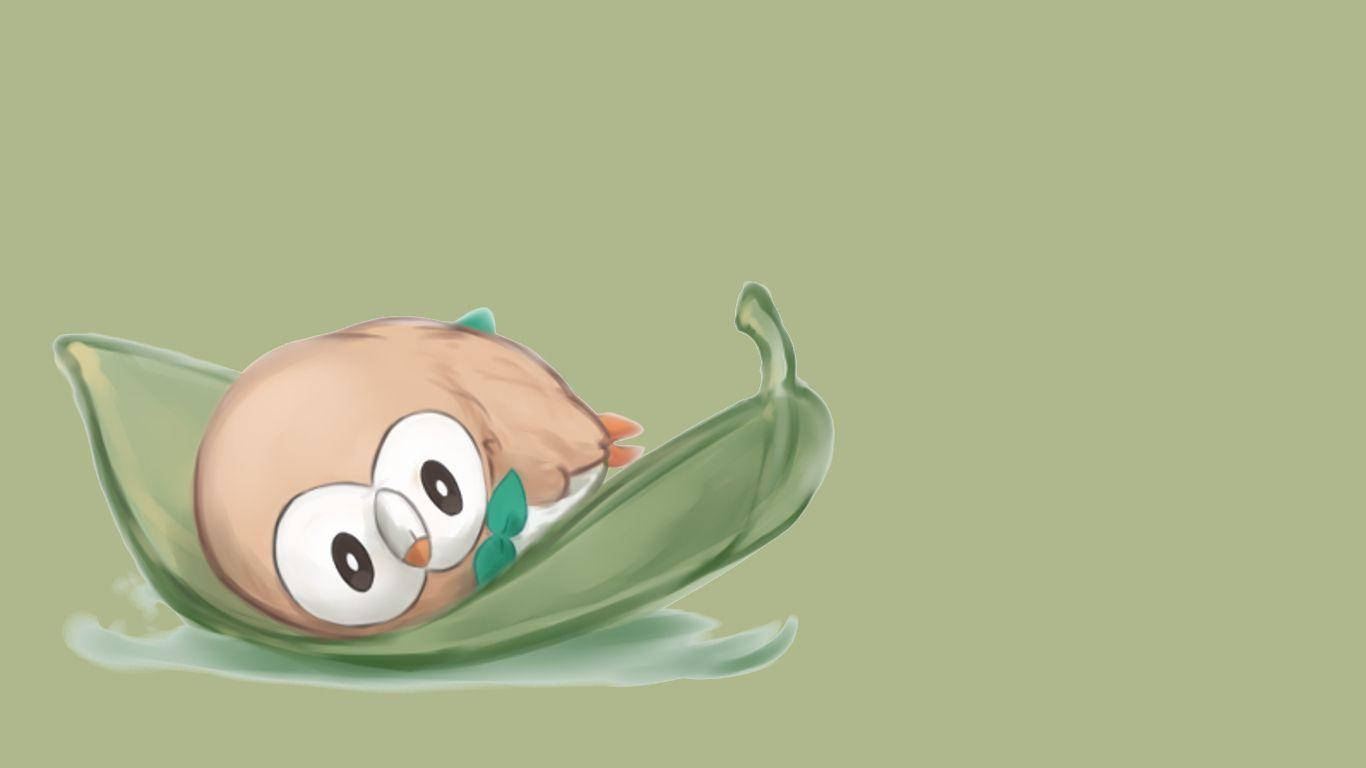 Rowlet Resting On Leaf Background