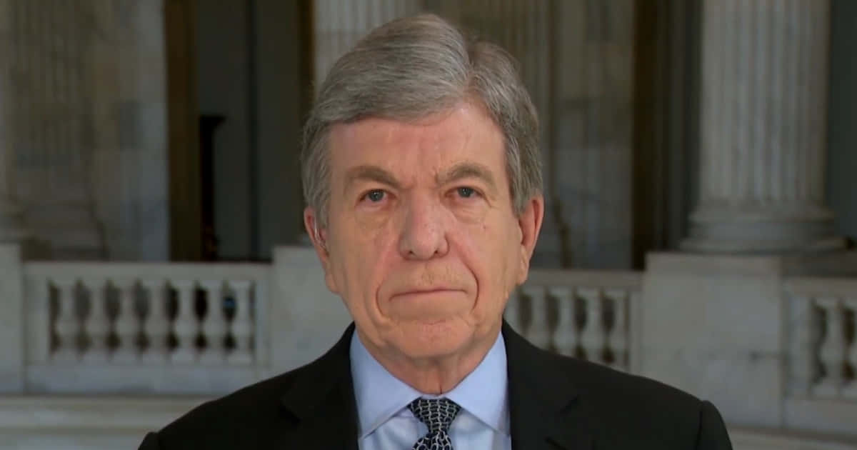 Roy Blunt Staring At The Camera Background