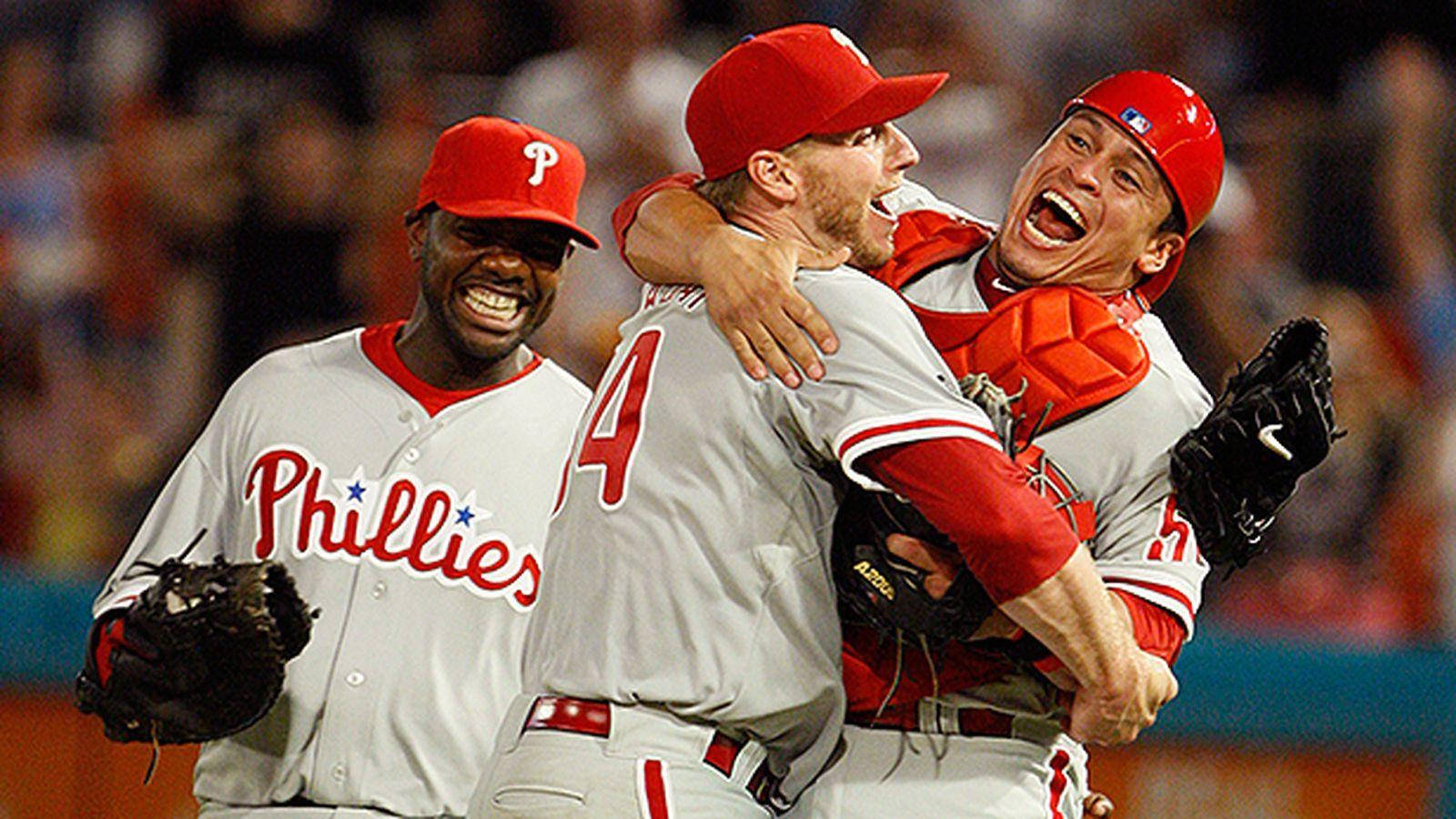 Roy Halladay Celebrating With Teammates Background