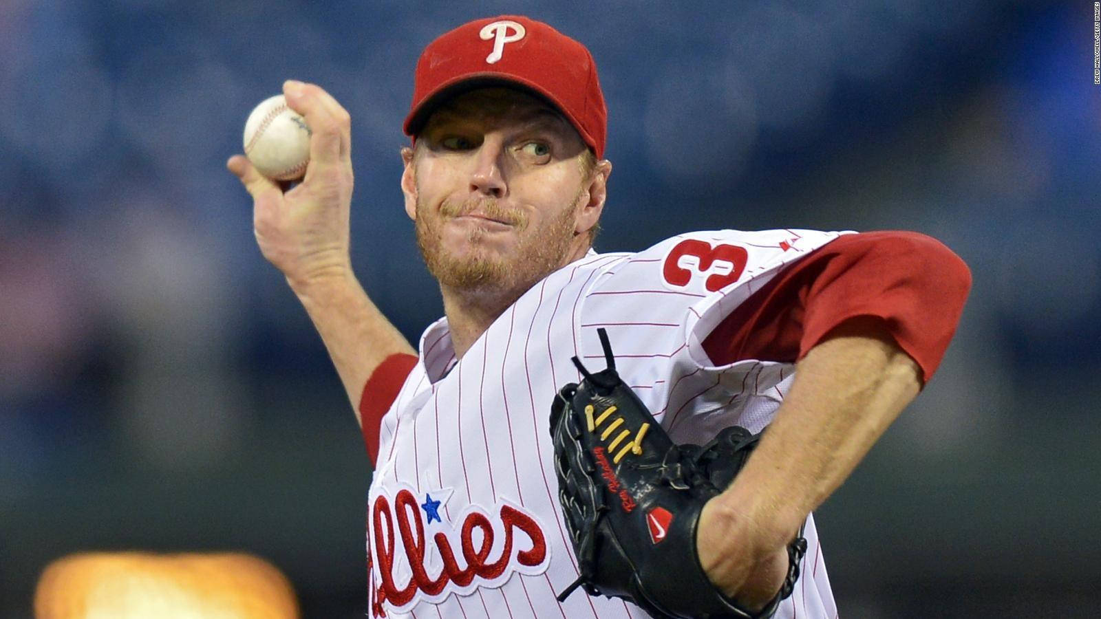 Roy Halladay Close-up While Throwing Baseball Background
