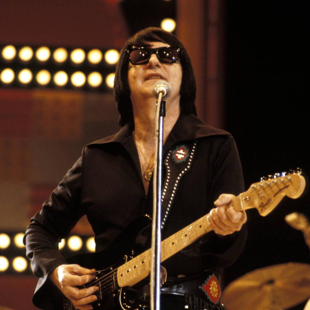 Roy Orbison Live Performance Bright Studio Background