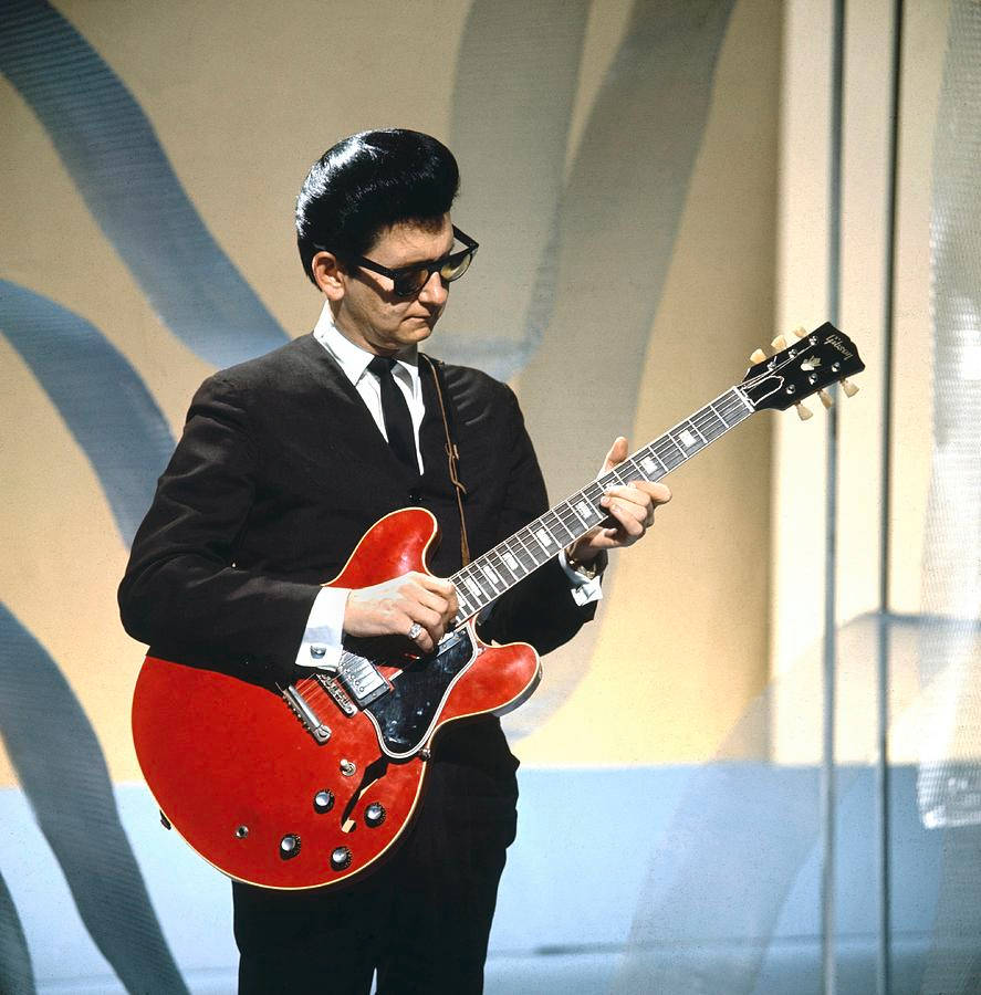 Roy Orbison Playing Red Guitar Poster