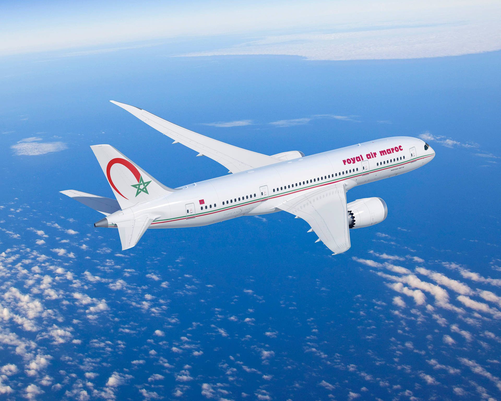 Royal Air Maroc Plane Above The Ocean Blue