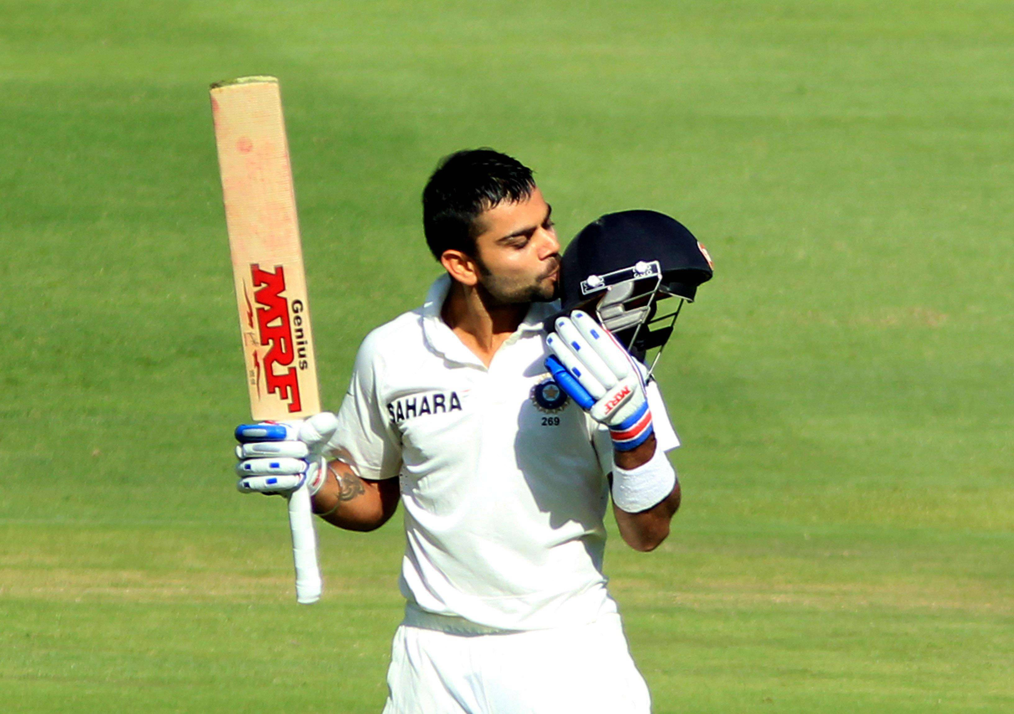 Royal Challengers Bangalore Captain Virat Kohli In Action During A Cricket Match Background