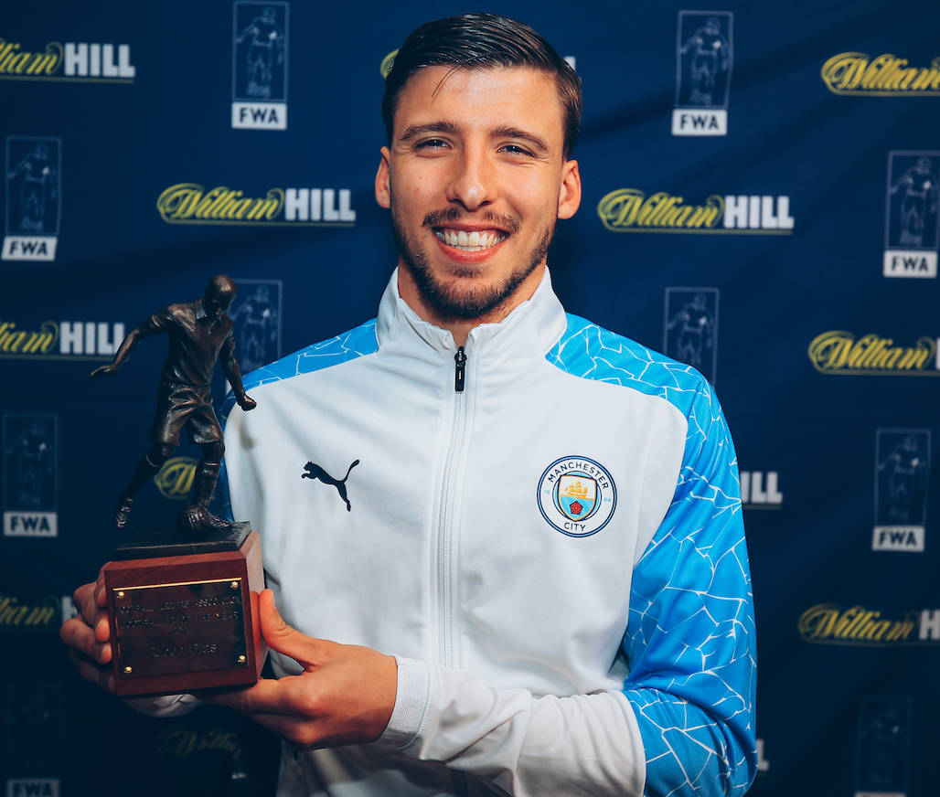 Ruben Dias With A Trophy