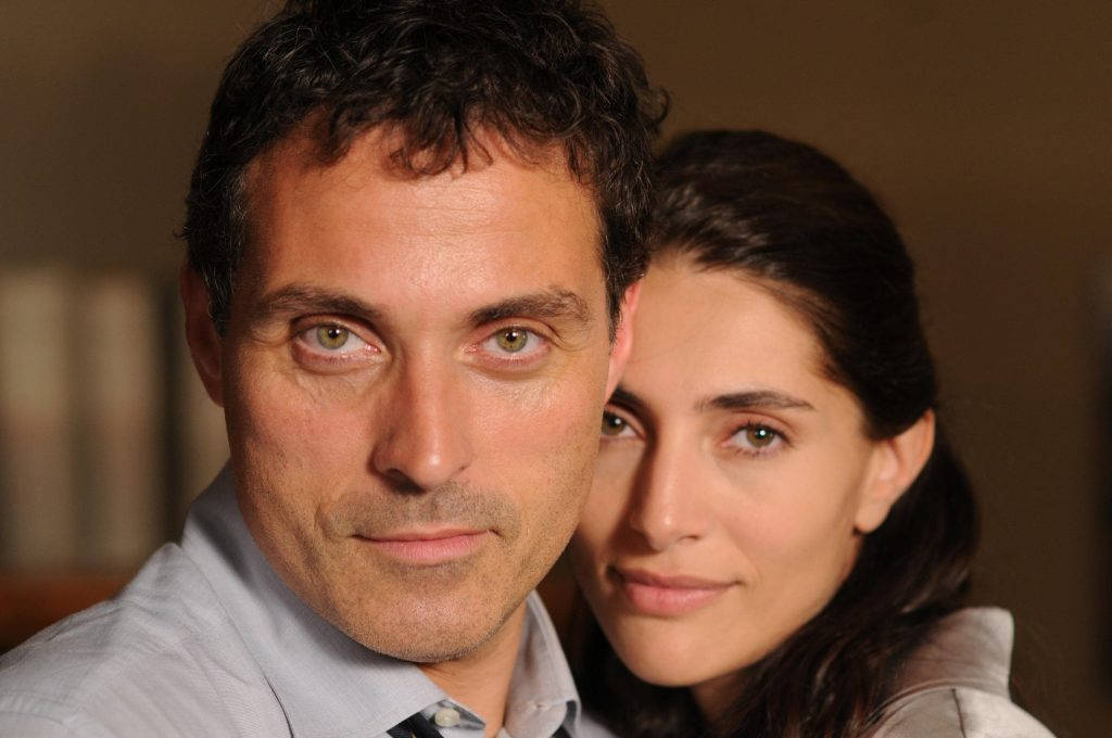 Rufus Sewell And Caterina Murino In Zen Background