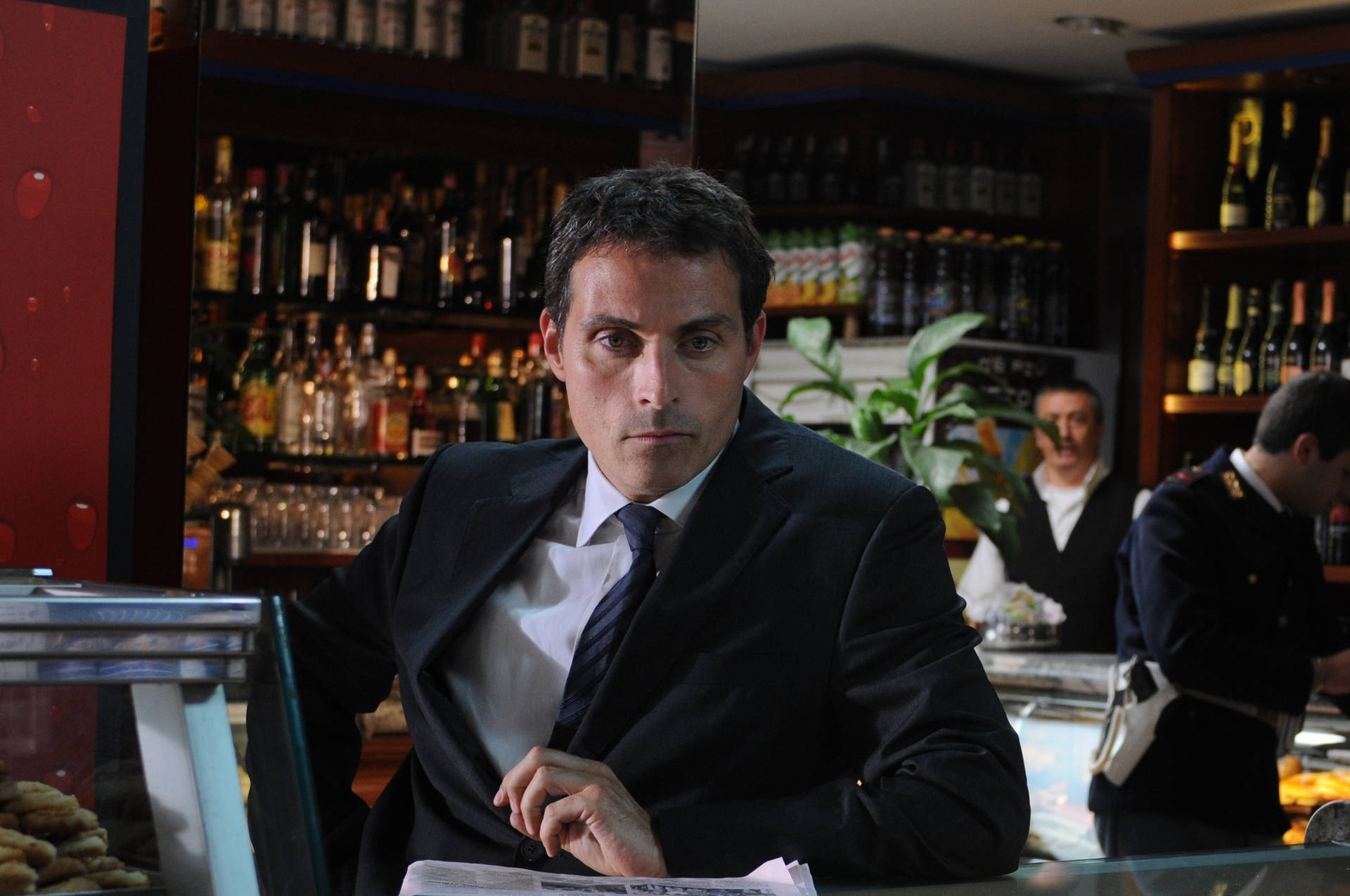 Rufus Sewell As Aurelio Zen In A Bar