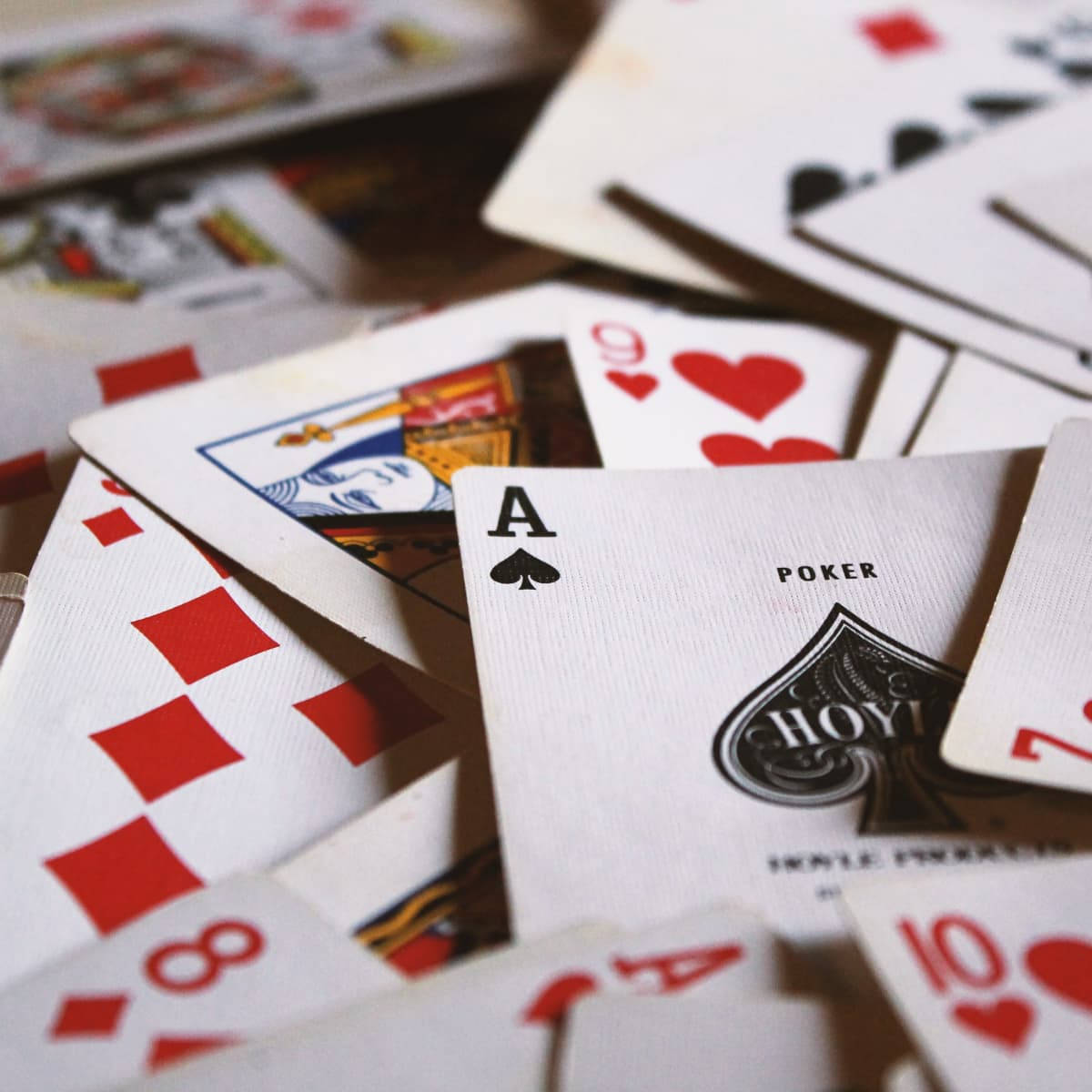 Rummy Playing Cards Shuffled On Table