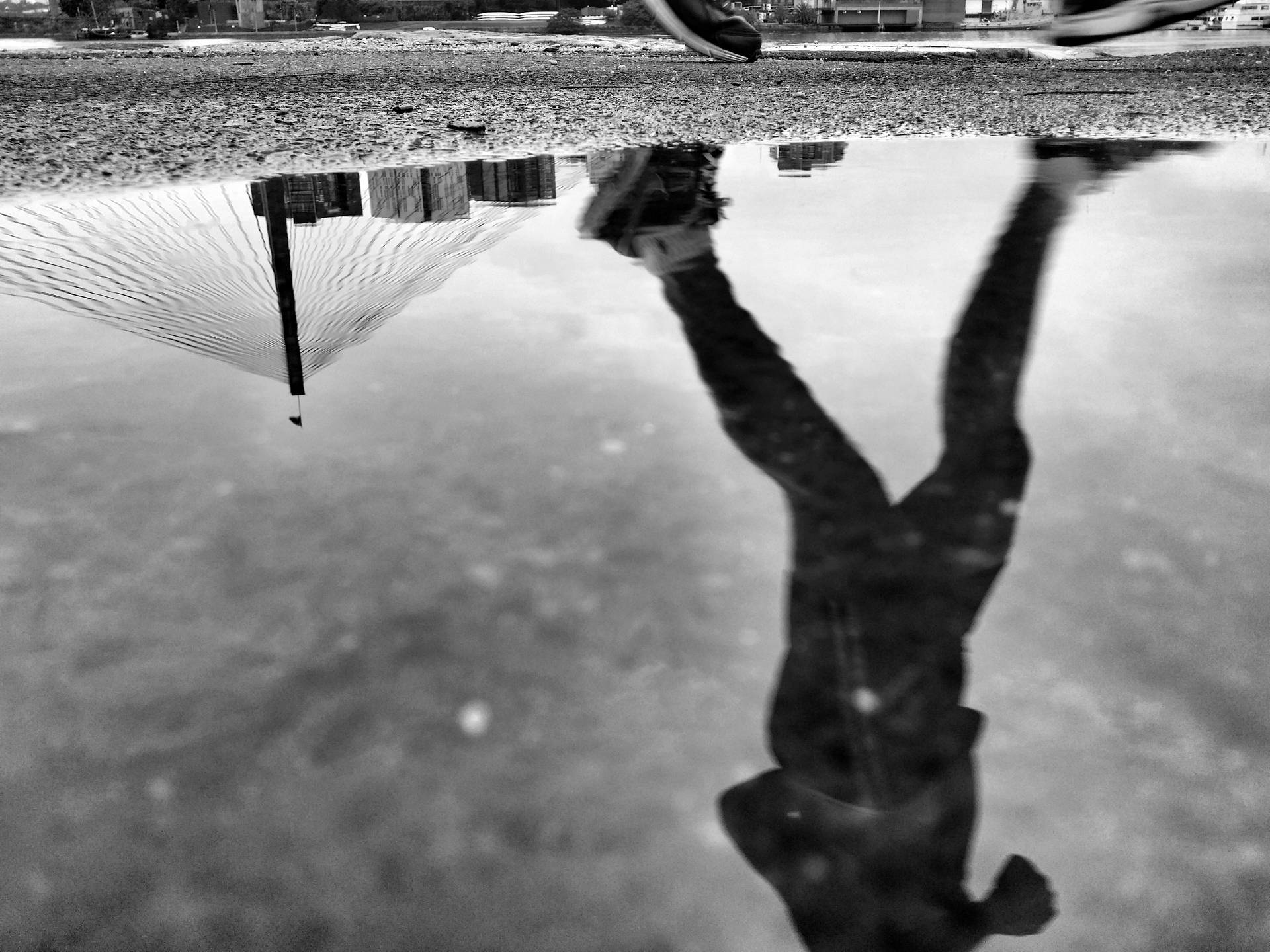 Runner's Reflection On Water Background